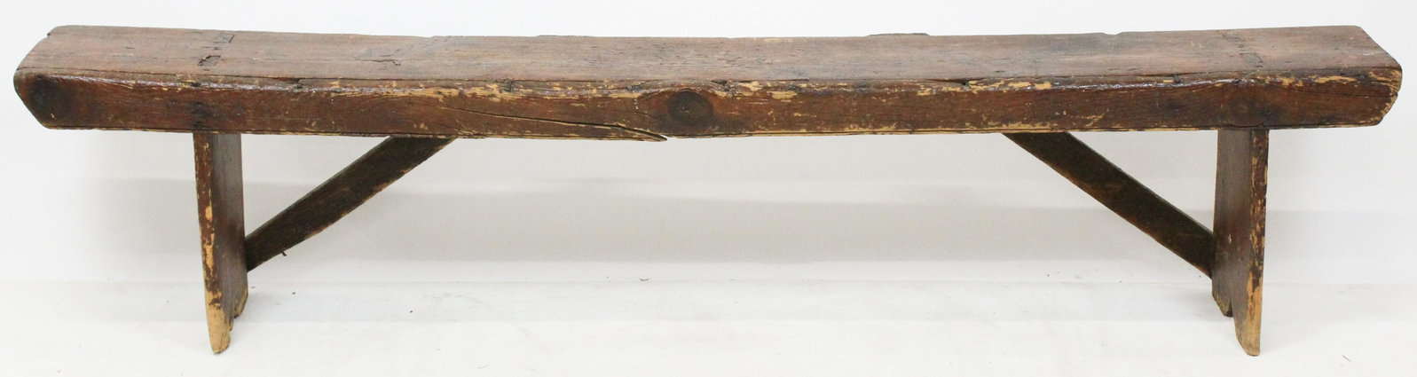 19th c Pine Bucket Bench with Bootjack Foot: 19th c Pine bucket bench with bootjack foot 11 x 79 x 17"