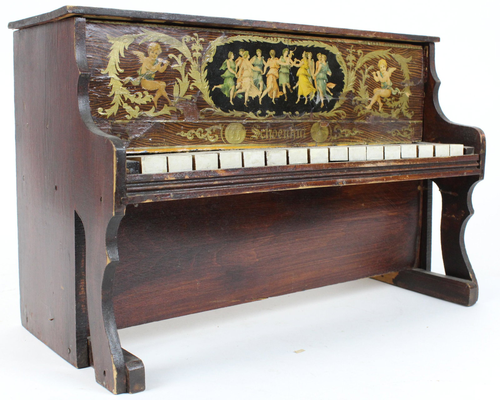 Early 20th c Schoenhut Piano: Early 20th c Schoenhut piano, paper litho front, 16 1/2" x 11" x 8"