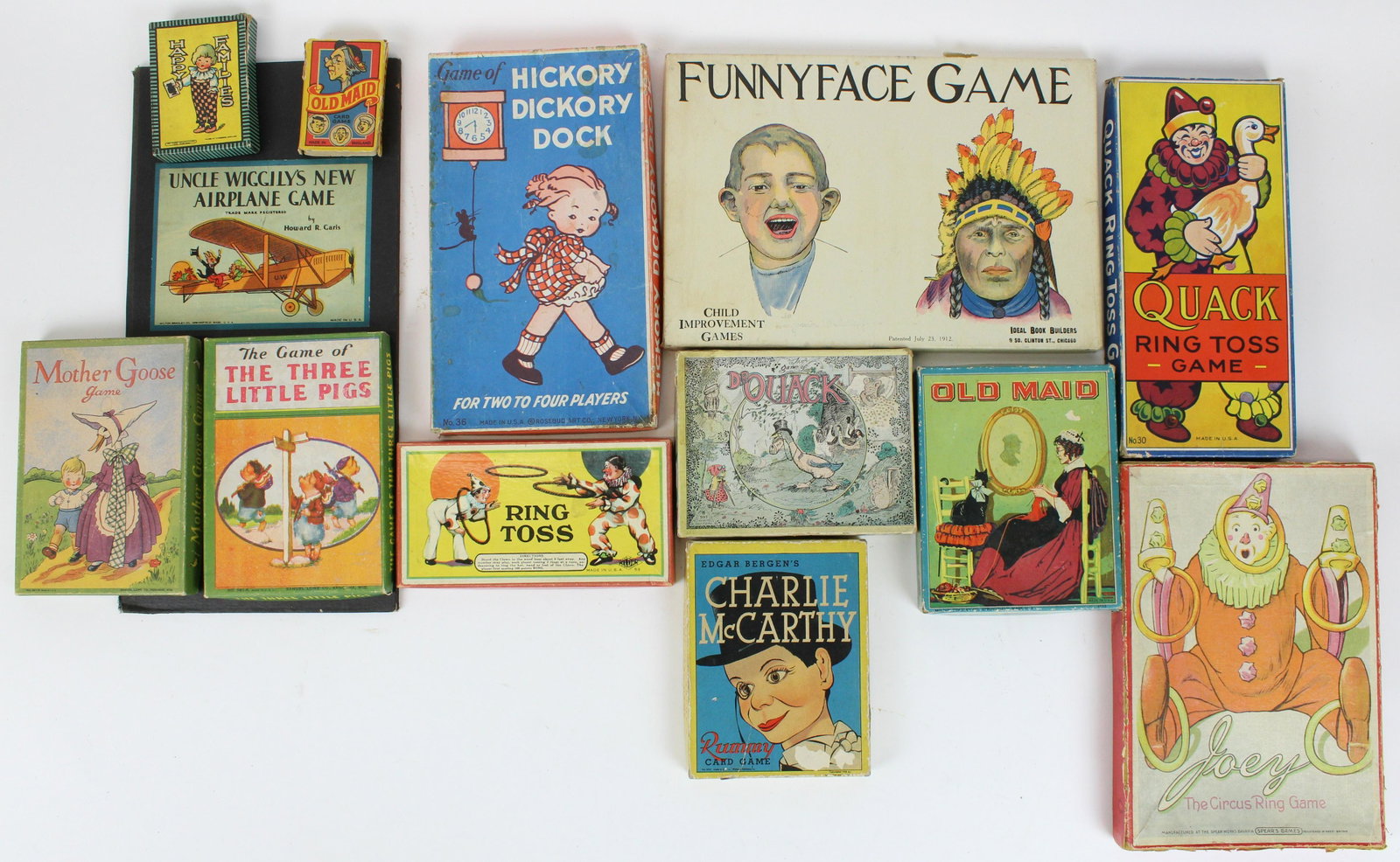 Early 20th c Boxed Games: Early 20th c games, game board, including Funnyface, Charlie McCarthy, Hickory Dickory Dock, Ring Toss, Joey, etc, most 7" to 12" (not collated for completeness)