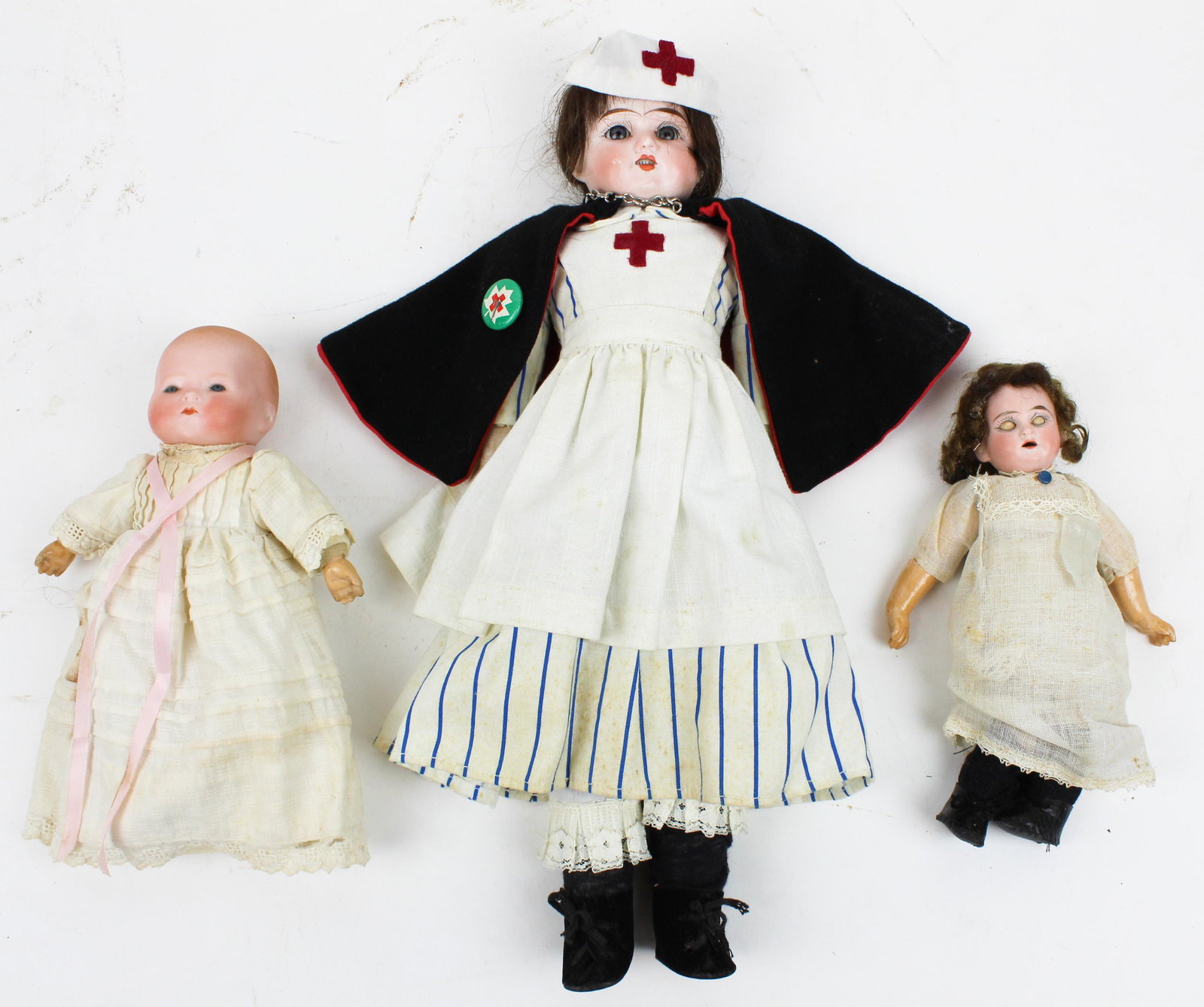Ruth, Bye-Lo, 1890 Small Bisque Dolls: Armand Marseille Ruth bisque doll (dressed as a nurse), AM Bye-Lo, small 1890 3/0 German bisque, hts 8" to 16"