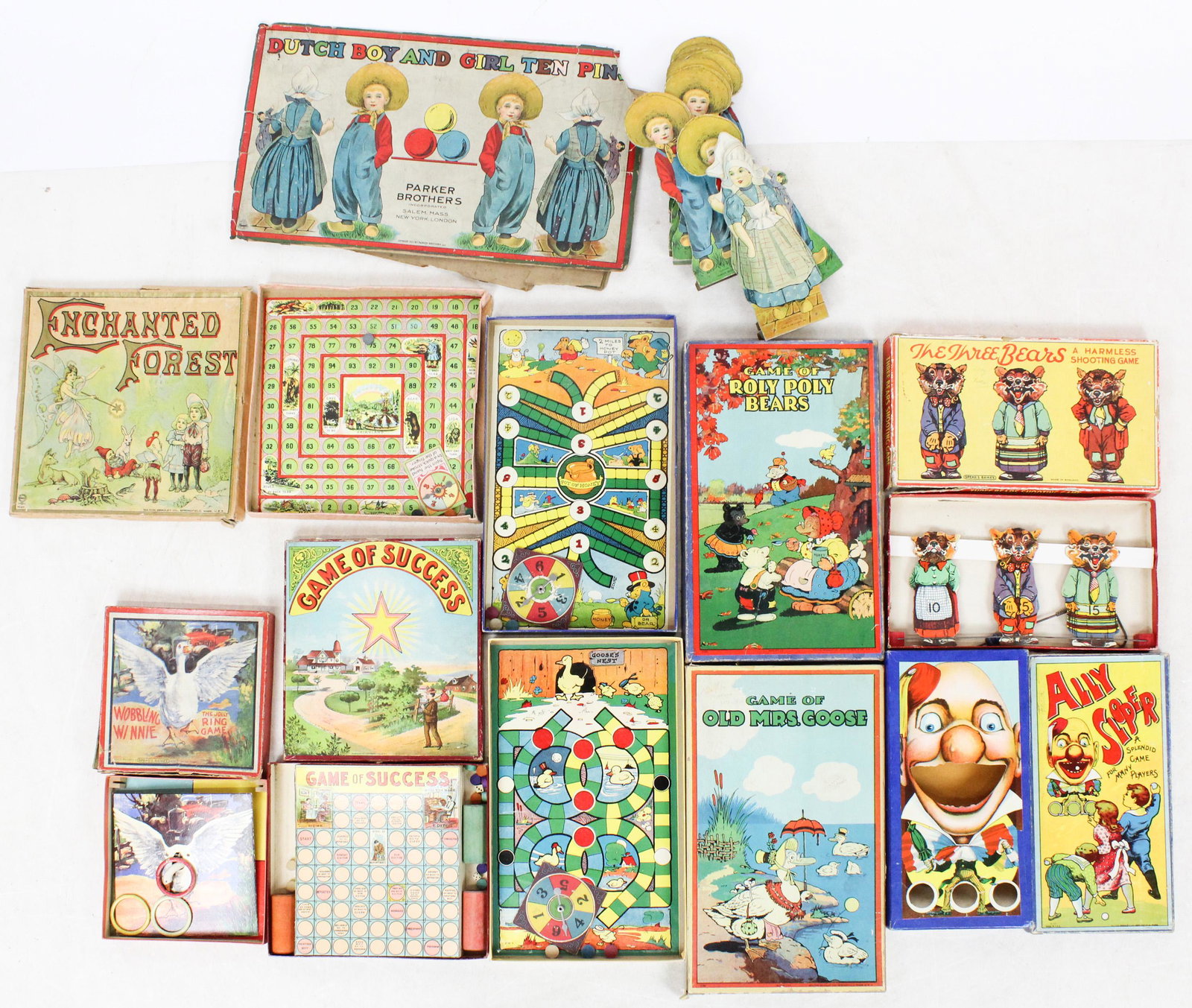 Early 20th c Boxed Games: Early 20th c boxed games (8 pcs), including Dutch Boy and Girl Ten Pin, Wobbling Winnie Ring Toss, Three Bears, Ally Sloper , Game of Success, Enchanted Forest, Roly Poly Bears, Old Mrs.Goose, varying