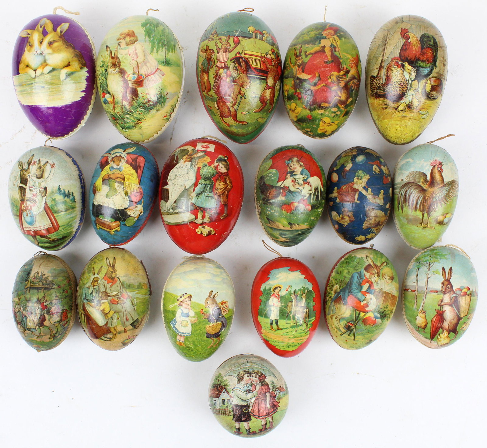 18 Easter Egg Candy Containers: 18 small to medium Easter Egg Candy Containers, color litho with Dresden trim, paper mache and boxboard, sizes 3" to 5 1/2"
