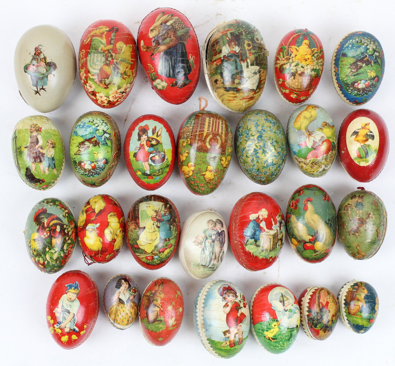 26 Easter Egg Candy Containers: 26 small Easter Egg Candy Containers, color litho with Dresden trim, paper mache and boxboard, sizes 2" to 3 1/2", sold with an early plastic egg