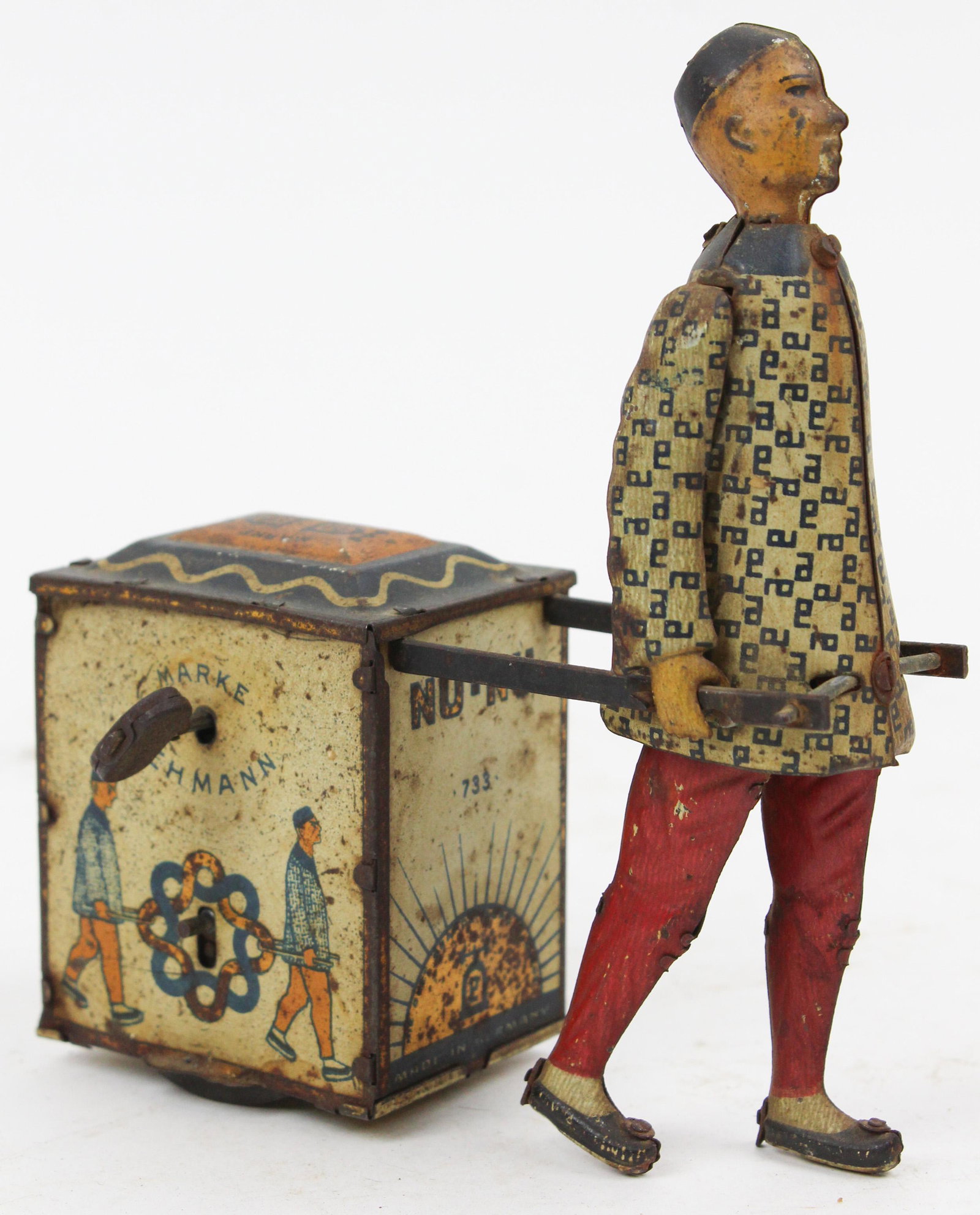 Early Lehmann Nu-Nu Tin Litho Toy: Early Lehmann Nu-Nu tin litho toy, some oxidation, ponytail missing, length 4 1/2", ht 5 1/2"