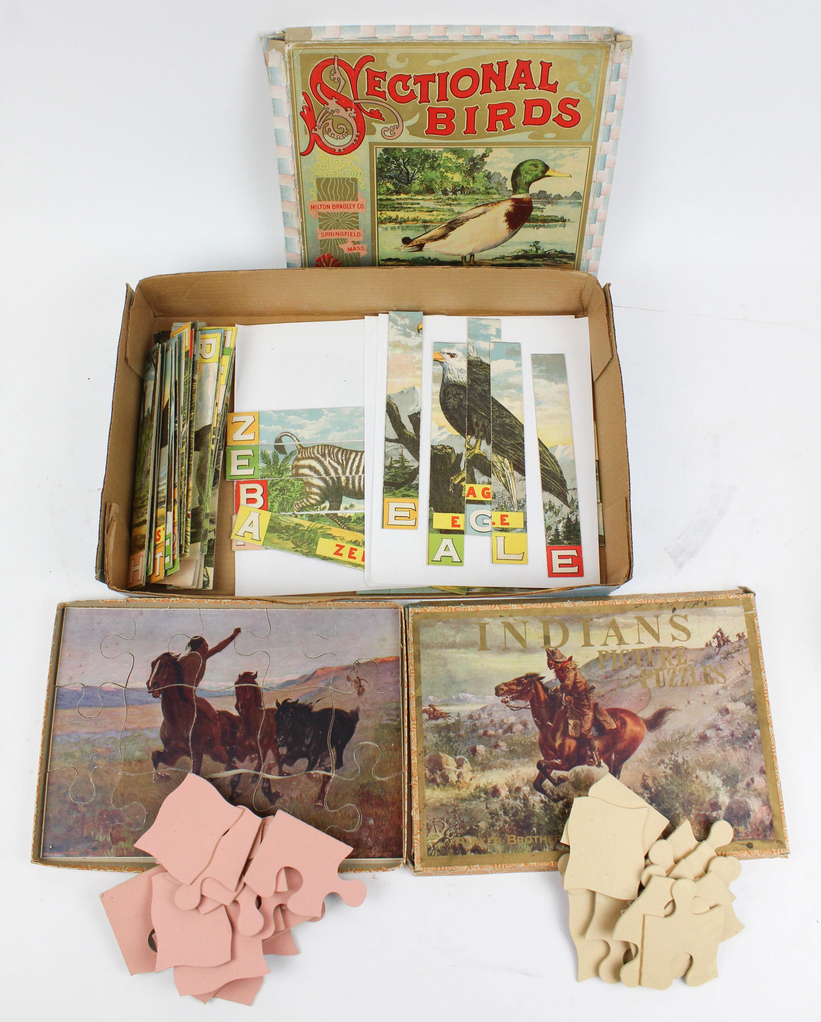 Indians, Sectional Birds Picture Puzzles: Parker Brothers Indians picture puzzles (3 puzzles), Milton Bradley Sectional Birds picture puzzles, (not collated), boxes 9" x 13", 11" x 11"