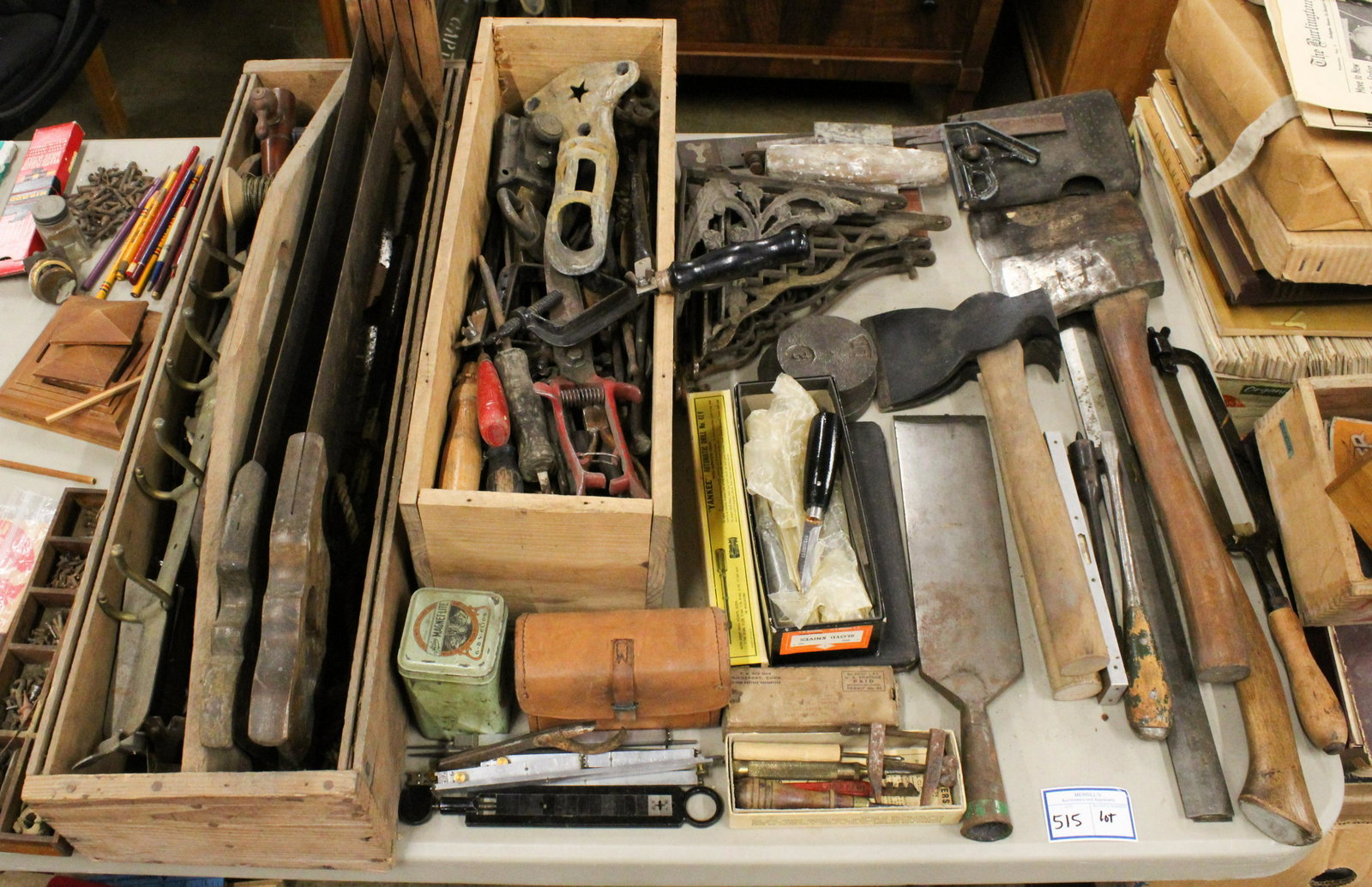 Large Lot of Antique Hand Tools: Large lot of antique hand tools including axes, hatchets, chisels, saws, squares, architectural brackets, whittling knives, Stanley Yankee screwdriver in original box, pine carrier, some machinists pr