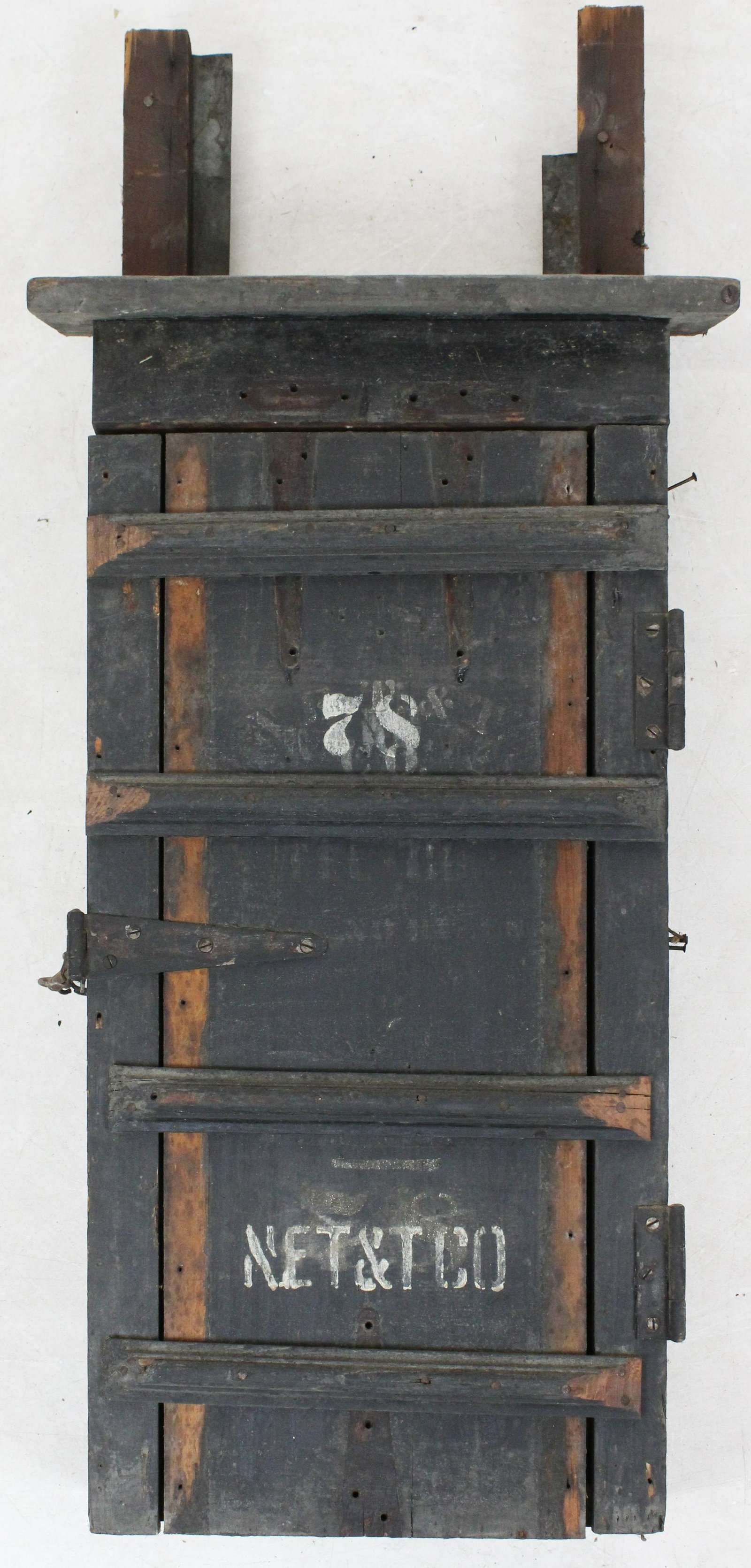New England Telephone Tool Cabinet: ca. 1910 New England Telephone and Telegraph Co. exterior wall mounted cabinet with weathered stencilled door, lock hasp, original instructions affixed inside, with some old contents 32" x 17" x 6"
