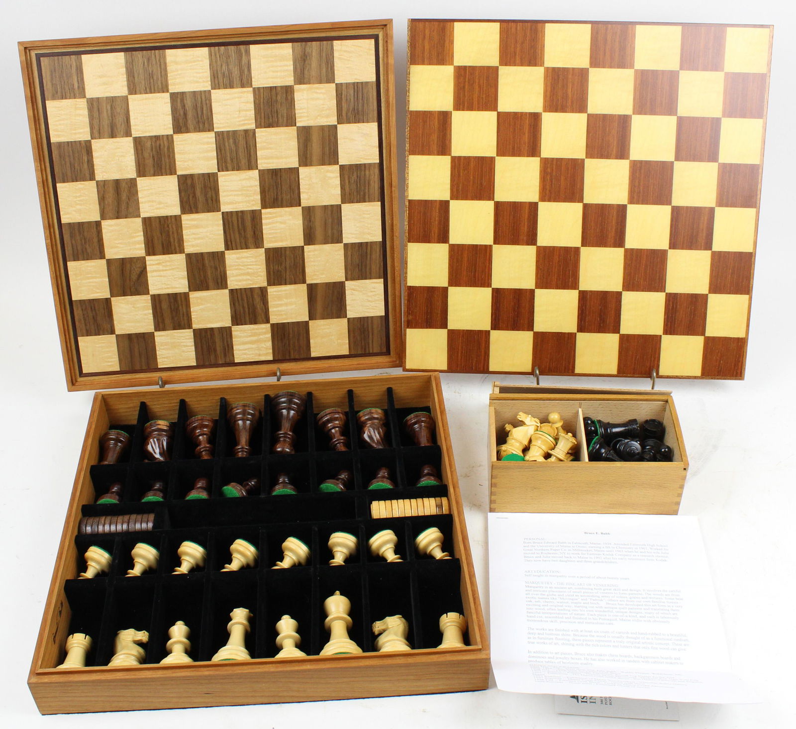 2 Inlaid Chess Sets including Bruce Babb of Maine: Two inlaid chess sets including cased set with marquetry inlaid gameboard top by custom woodworker Bruce Babb of Damariscotta, Maine, having cherry, walnut and tiger maple inlays, the other in teak an