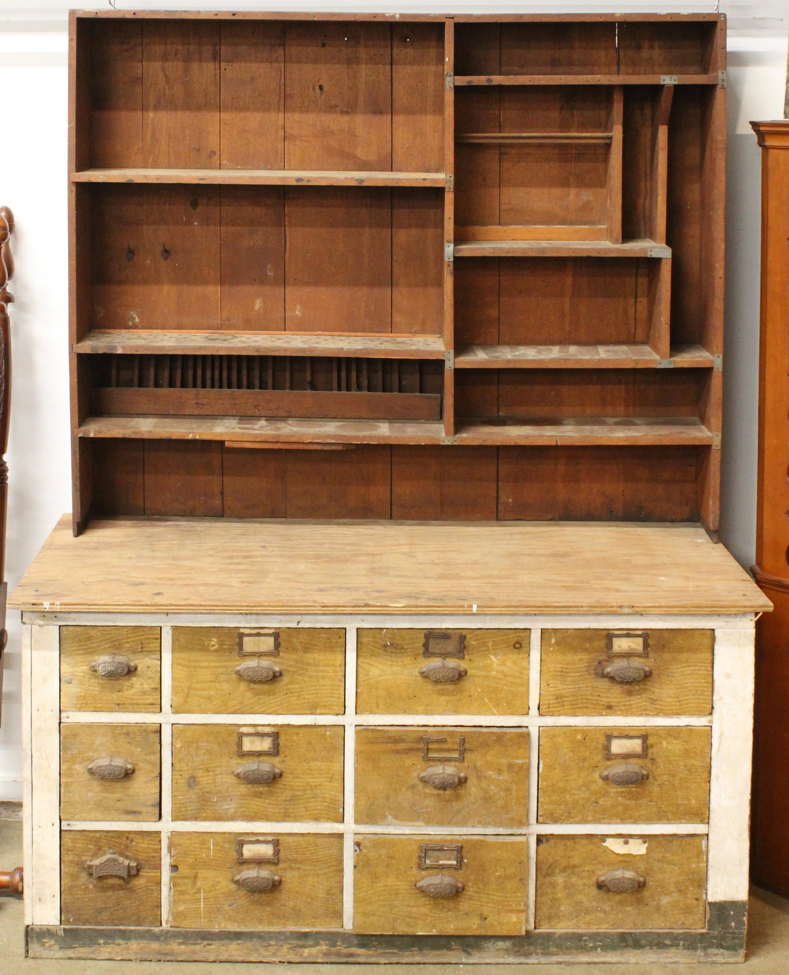 19th c Pine Workbench with Associated Top: 19th c Pine workbench with associated 19th c pine tool cupboard top 12 drawer base with grain painted drawers, 20th c make do replacement of work surface 63 X 87 X 24"