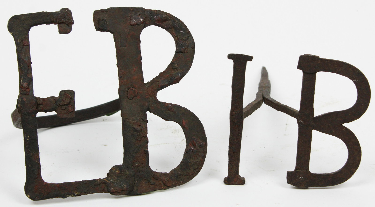 Two Early 19th c Wrought Iron Sheep Stamps: Two early 19th c wrought iron sheep stamps,E B, I B, hts 6", 4", sold to benefit the Vermont Historical Society