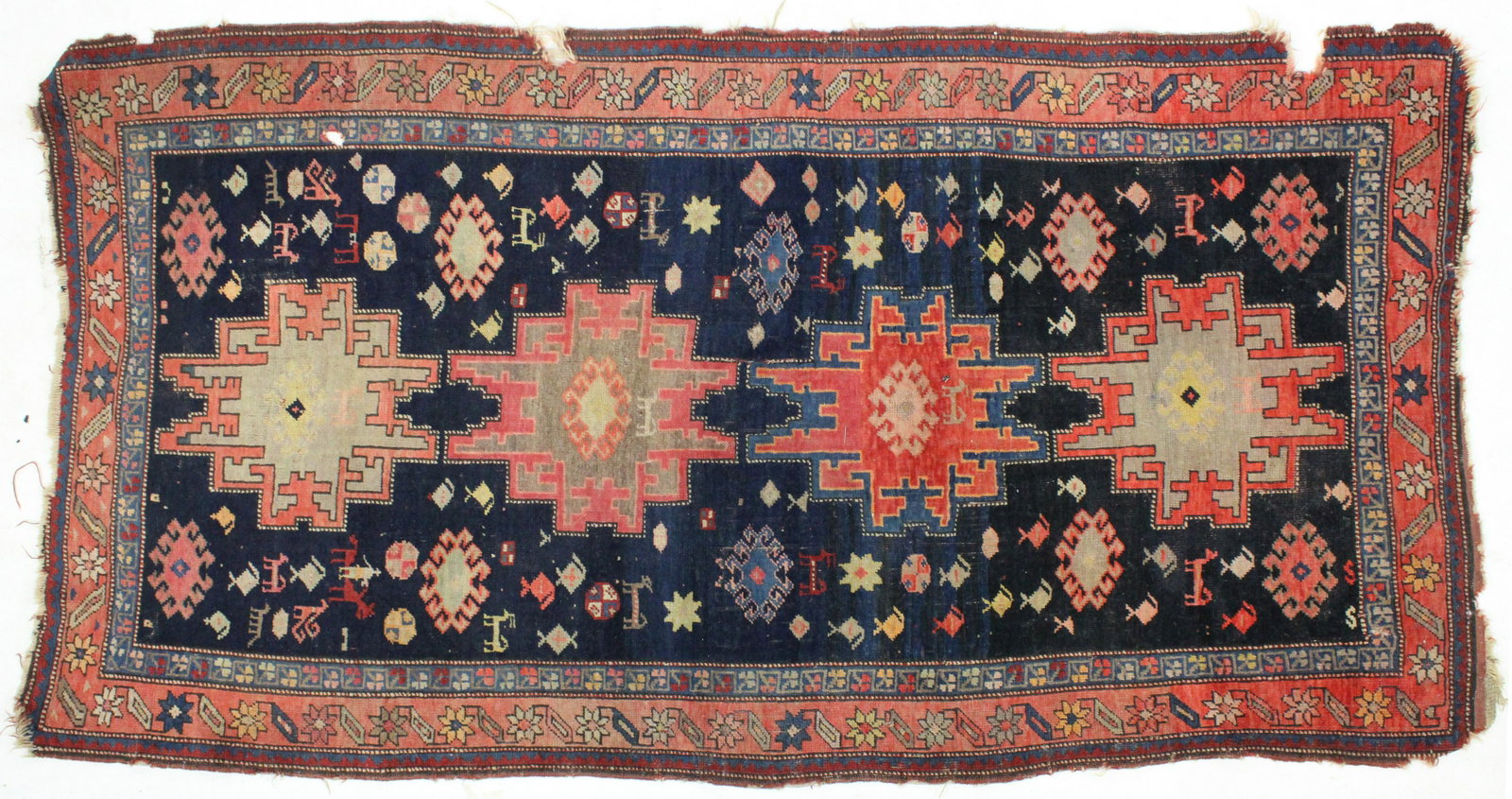 Antique Kazak Tribal 4 Medallion Oriental Rug: Late 19th- Early 20th c South Caucasus Kazak/ Tribal 4 medallion area rug, deep blue background filled with boteh and animals, small edge tears, 3' 7" x 6' 11"