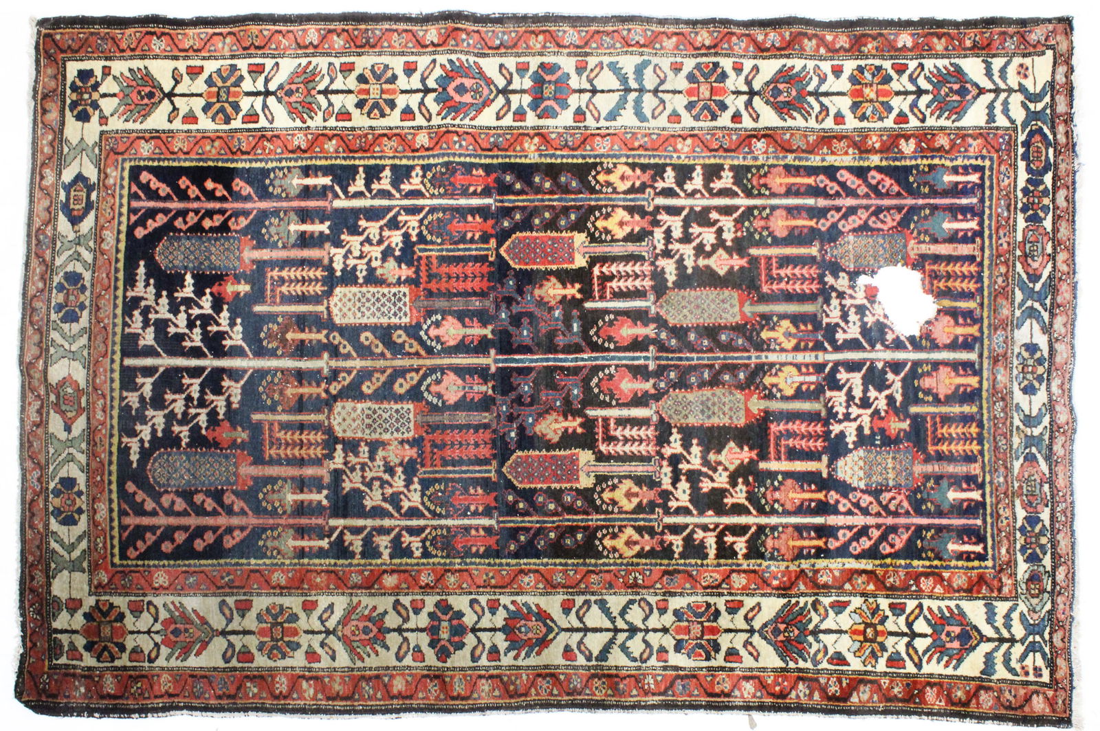 Antique Persian Tree of Life Oriental Rug: Late 19th- Early 20th c Persian Tree of Life Oriental rug, damaged area, 4' 5" x 6' 8"