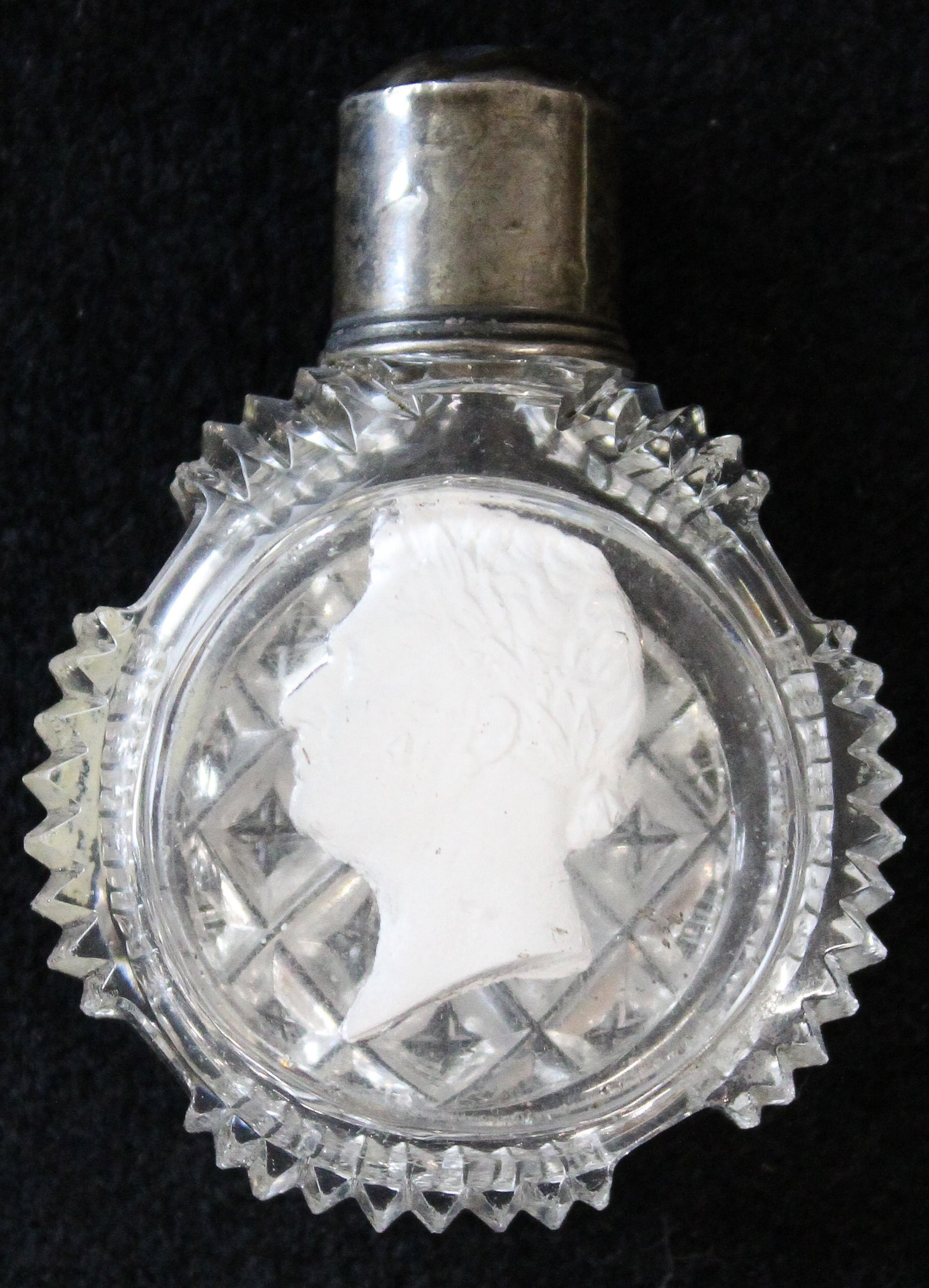 French Crystal Sulphide Perfume Bottle: 19th c. French crystal cut glass perfume bottle featuring classical cameo portrait of man in profile, possibly Baccarat or Apsley Pellatt, having silver screw on 2.5"-1.75" -dents to cap, nicks to edg