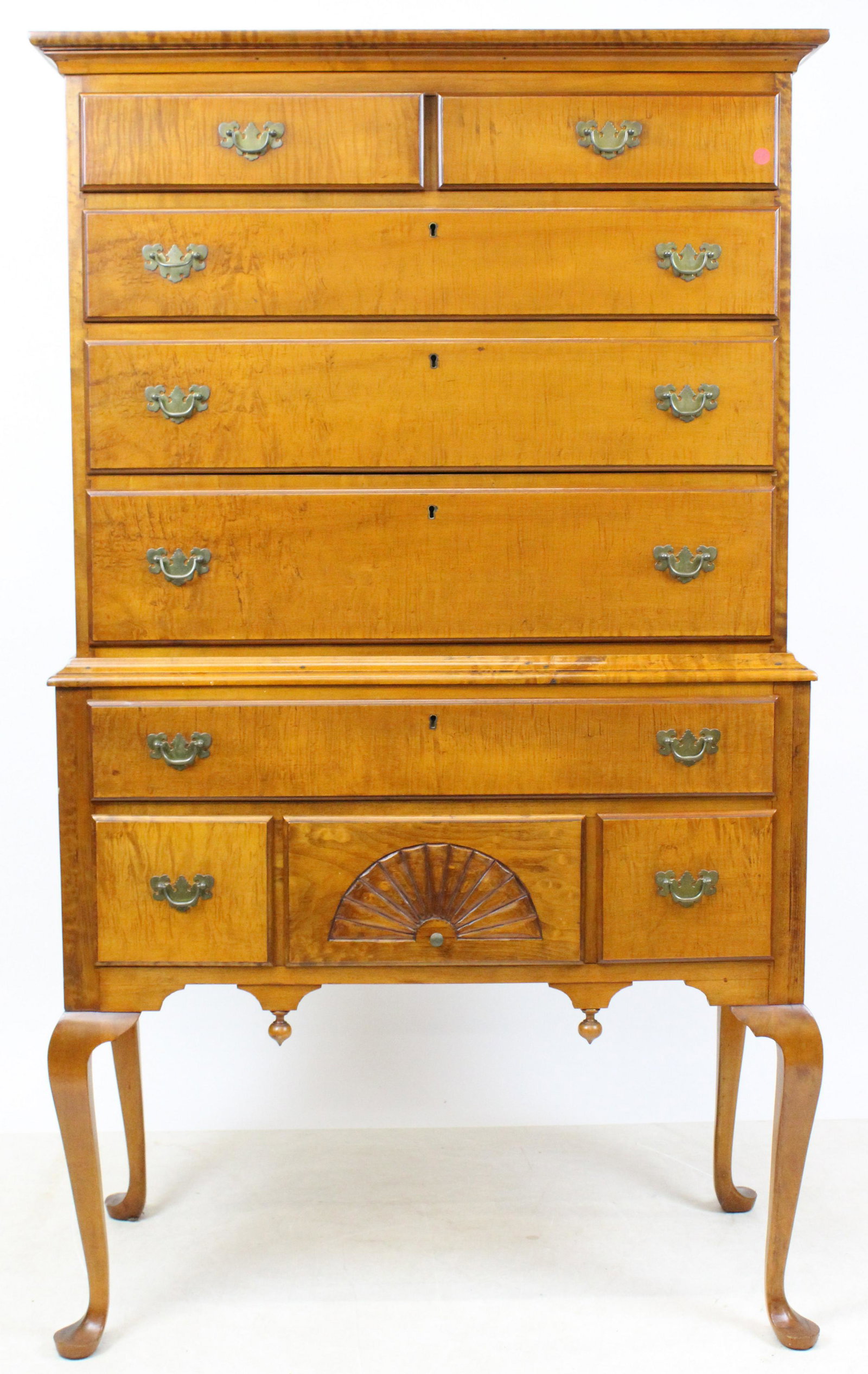 Custom Tiger Maple Highboy: 20th c Queen Anne style tiger maple highboy. 2 over 3 drawer upper section over a single drawer over 3 drawers with fan lower section. Cabriole leg with pad foot. 36" w x 63" h, x 18" d