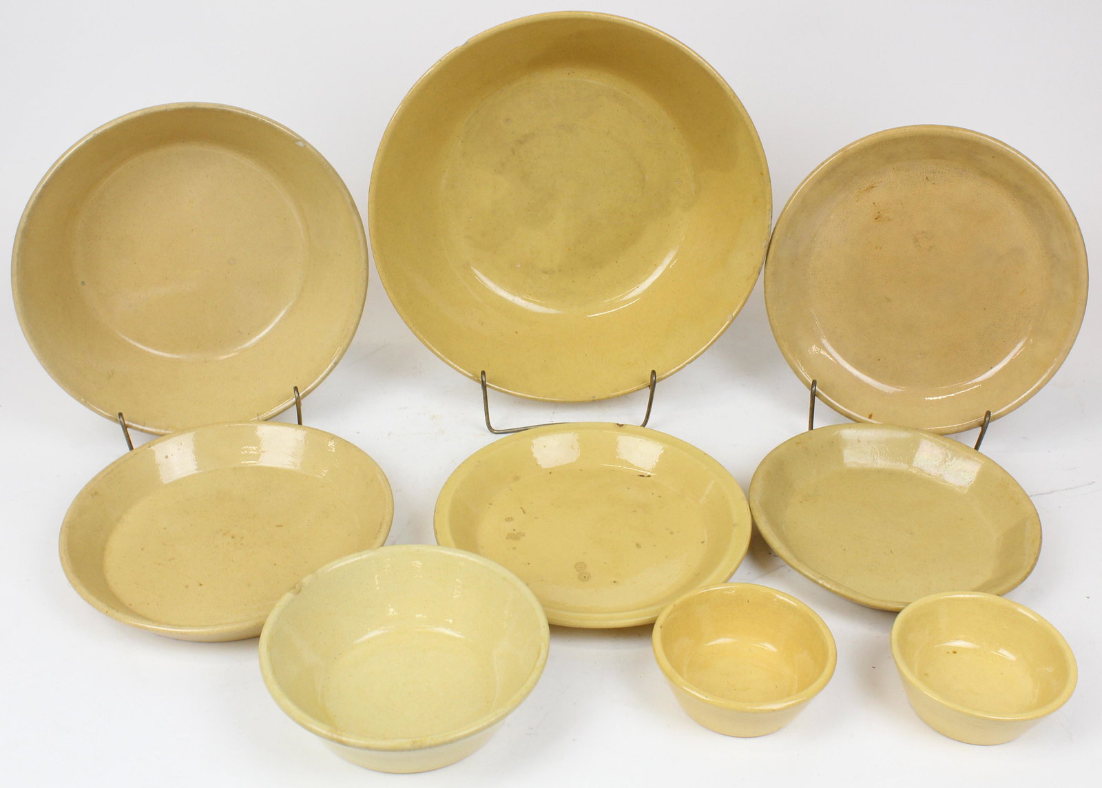 Group of 9 Yelloware Pottery Baking Pans, Dishes: Group of 9 yelloware earthenware pottery baking pans and dishes with canted sides 4.5" x 13"