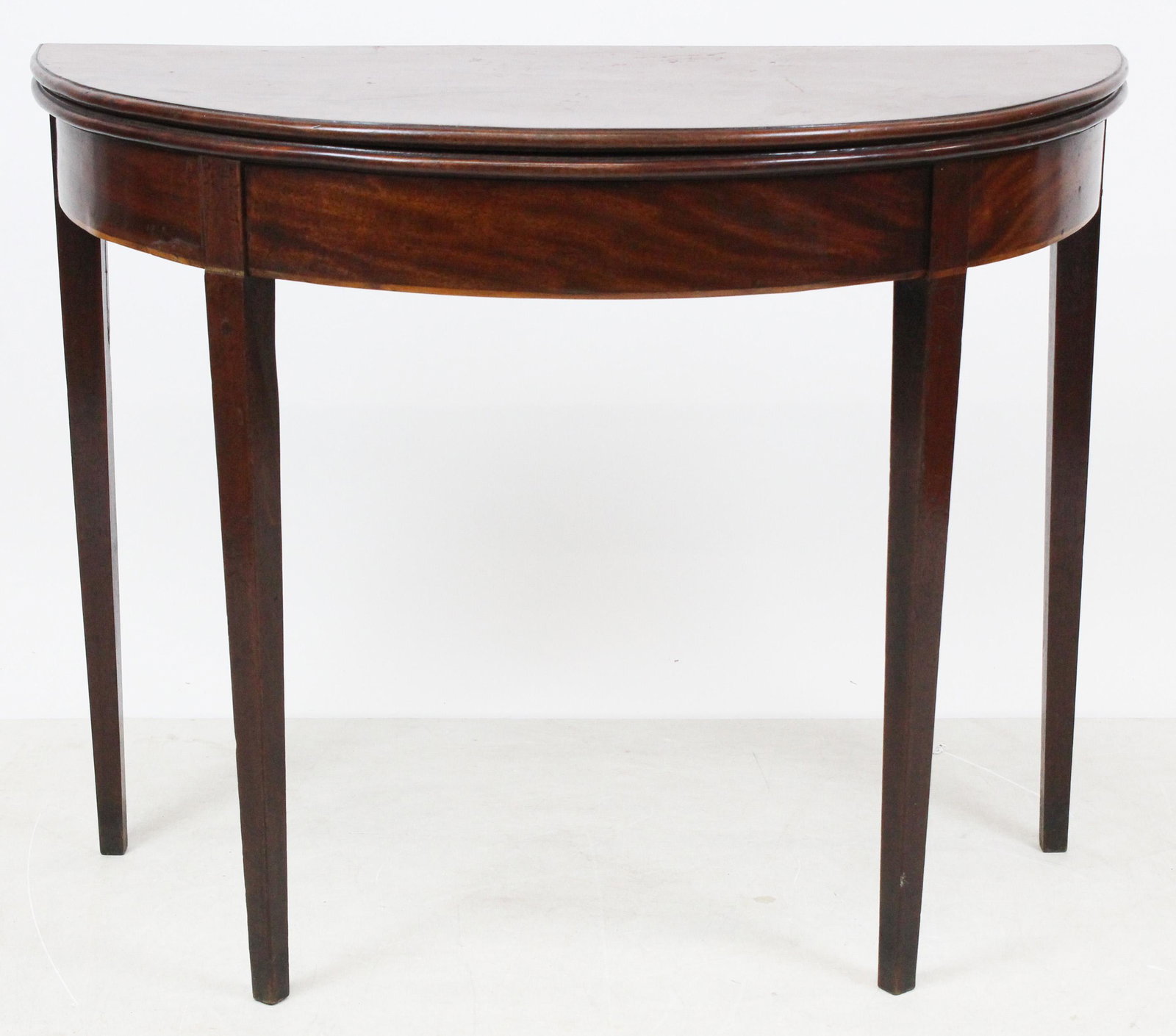 Hepplewhite Mahogany D Shaped Card Table: 19th c Hepplewhite D Shaped Card Table. Satin banding. Good condition. 36" wide. 29" h, 18" deep. -sold to benefit the Vermont Historical Society