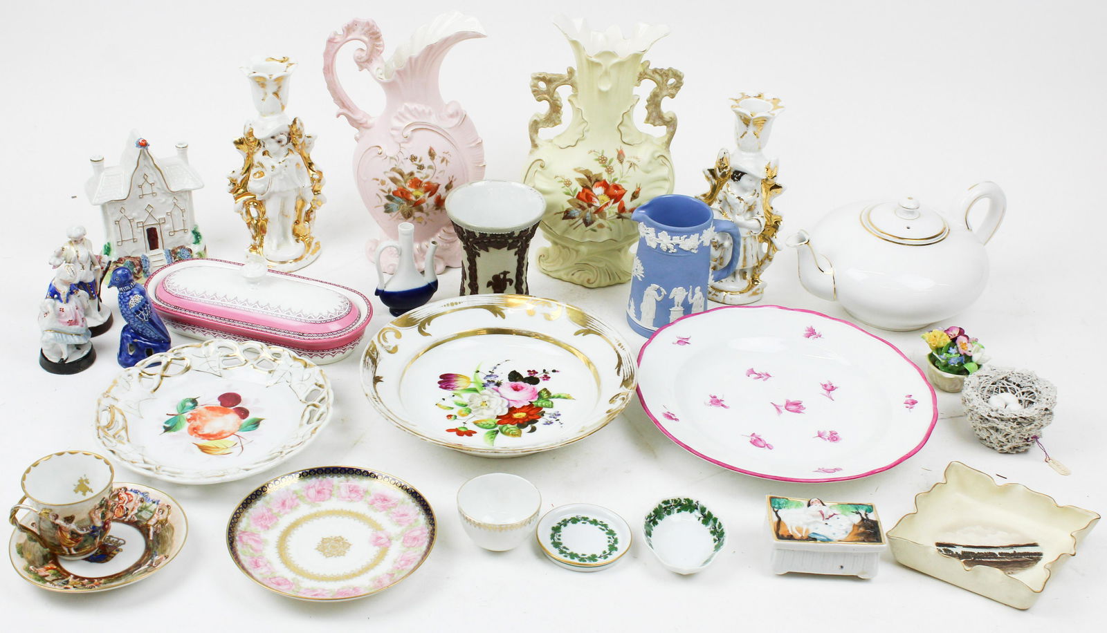 Lot of Mixed European Porcelain and Ceramics: Large lot of mixed European porcelain and ceramics including fine handpainted Capodimonte cup and saucer, small Meissen butter pat and salt cellar, Victorian floral ewer and mantel vase, pair of Paris