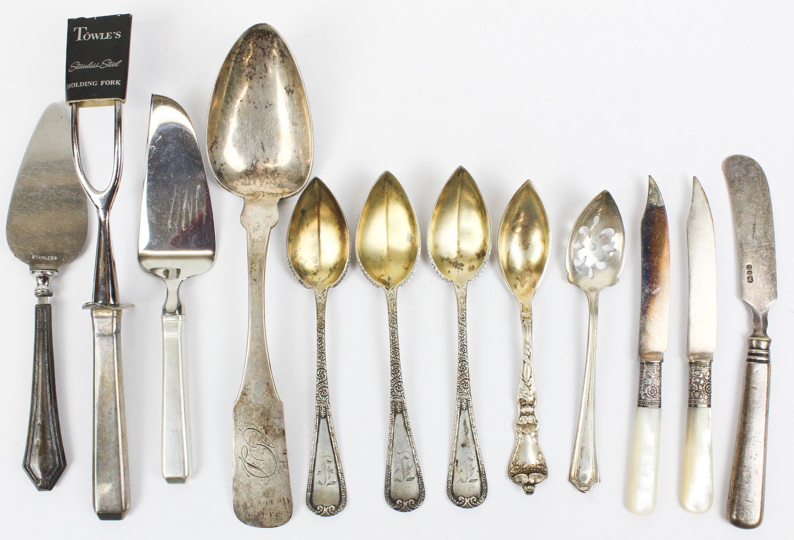 Group of Coin and Sterling Flatware: Group of assorted coin and sterling silver flatware including 3 grapefruit spoons with vermeil bowls, Tweedy & Barrows NYC coin silver tablespoon, Towle Craftsman pattern cheese knife and meat holding