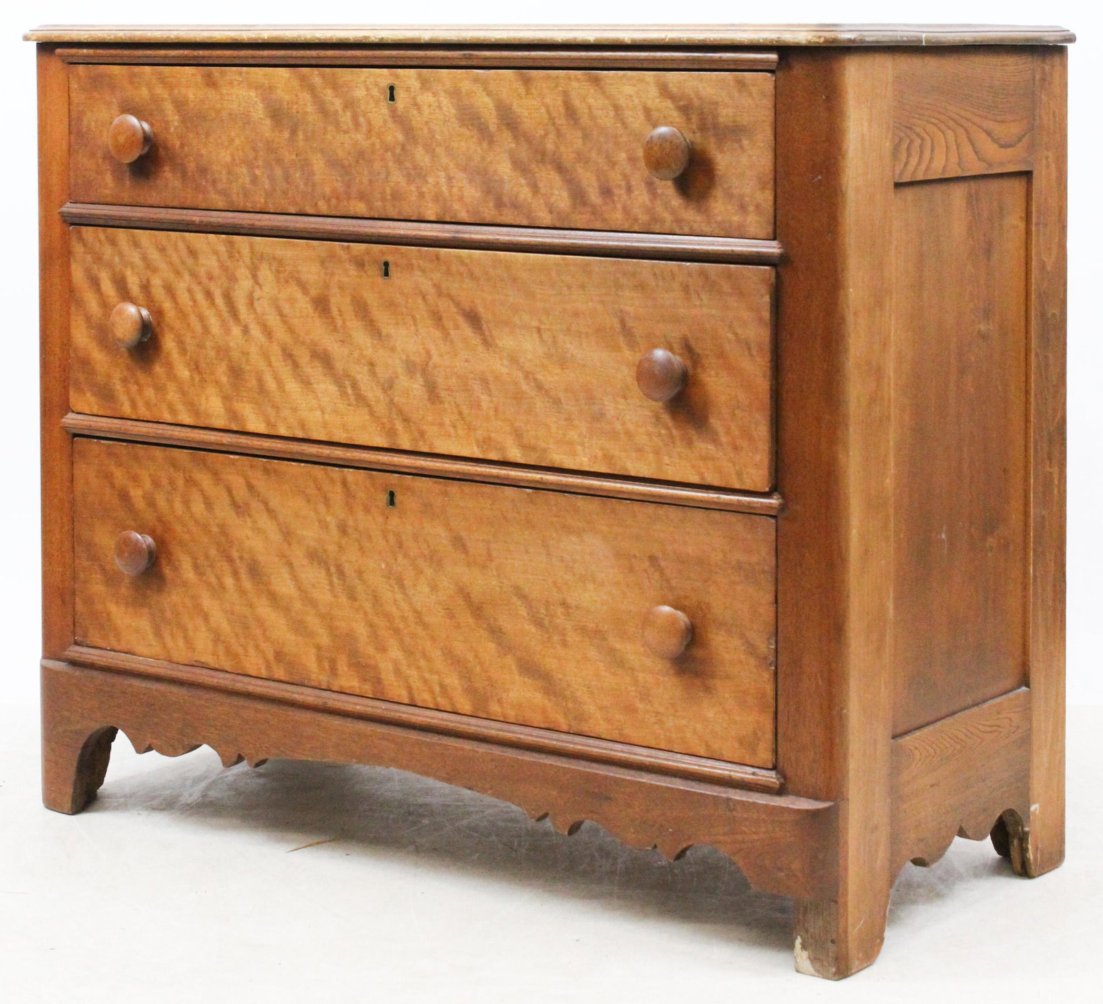 19th c Birch 3 Drawer Chest: 19th c refinished flame birch 3 drawer chest. Turned knobs, shaped base. 33" h, 40" w, 18" d.