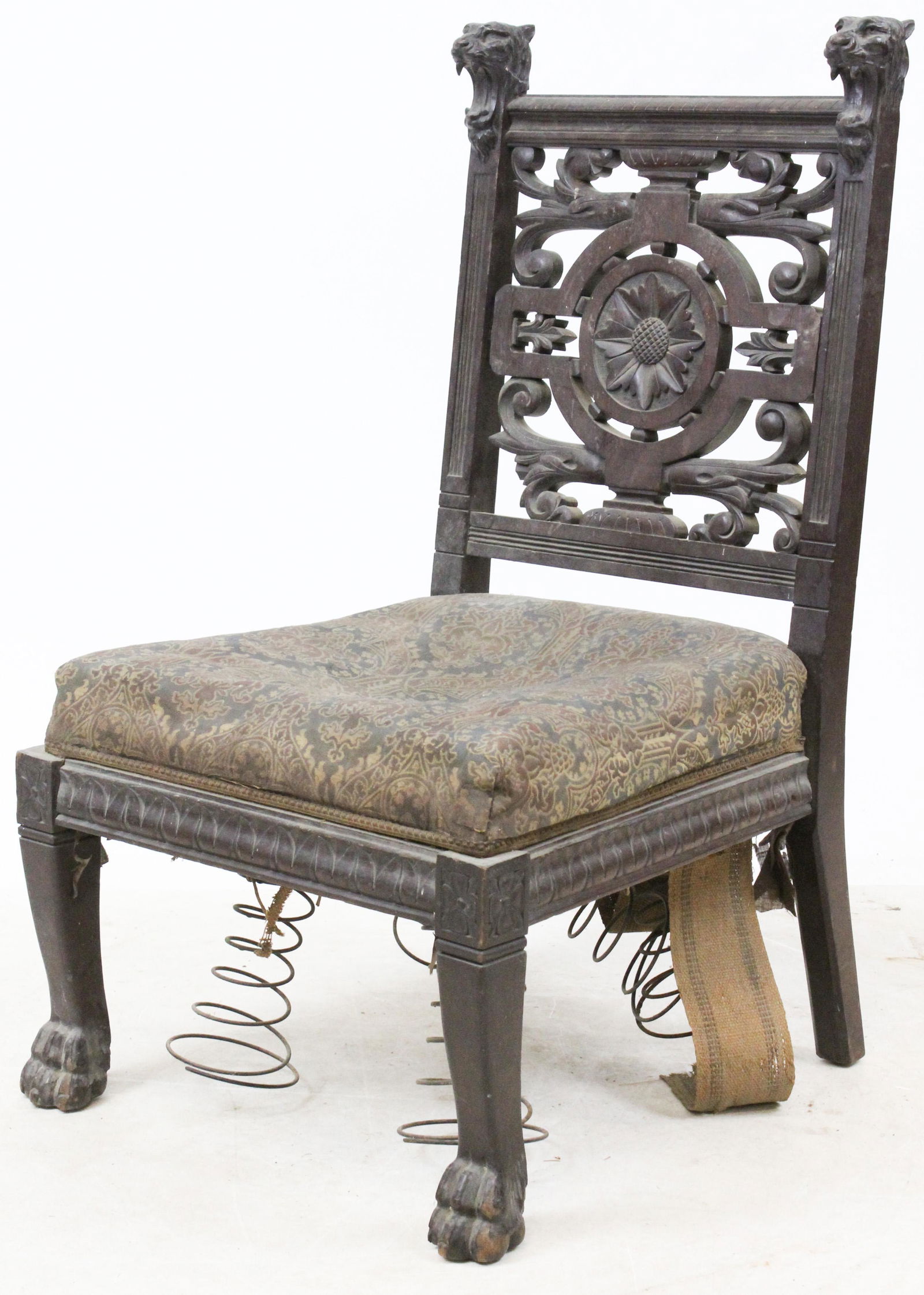 19th Classical Revival Carved Side Chair: Late 19th c walnut side chair. Double open mouth lion carved bust heads, floral & acanthus open carved back, carved claw feet. 35" h, 19" w, 15" seat h.