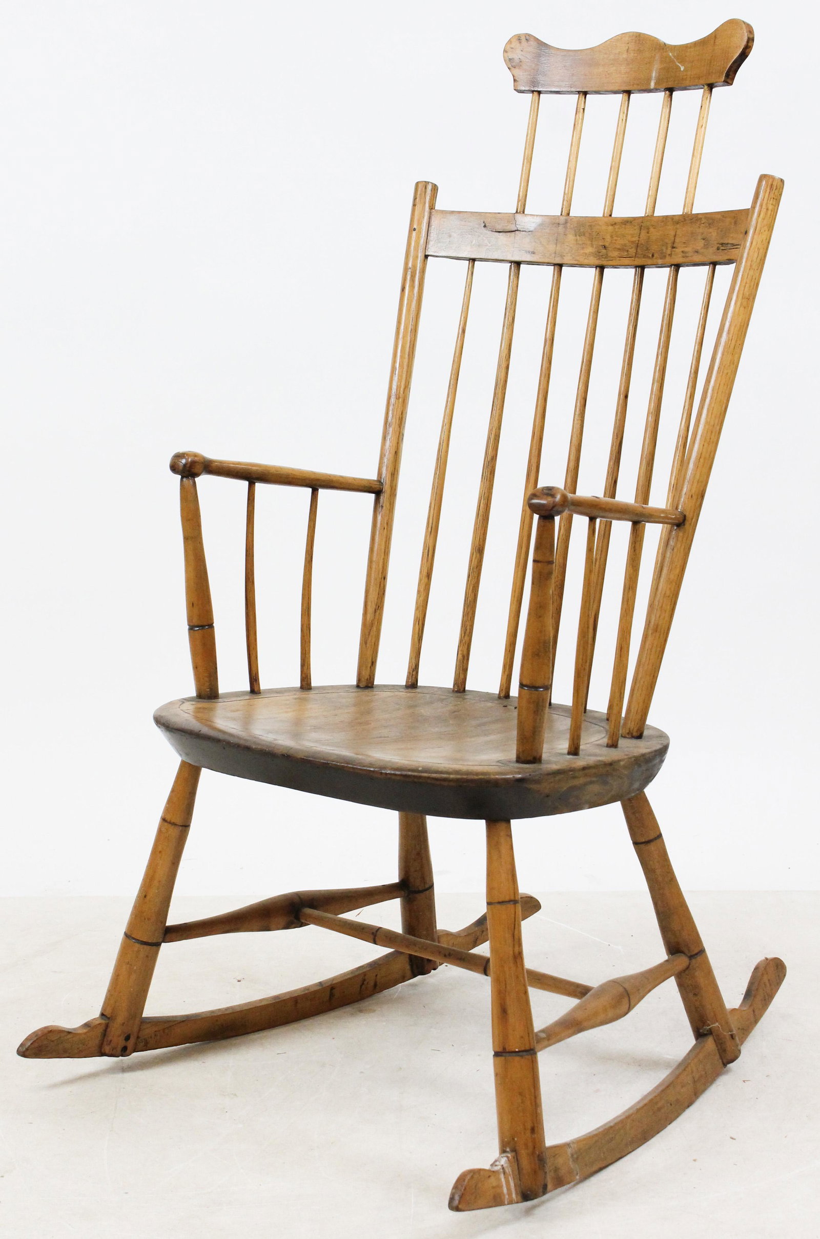 19th C Windsor Arm Rocking Chair: 19th c New England Windsor arm rocking chair. Comb back, bamboo turnings, H stretcher. Scrub surface.