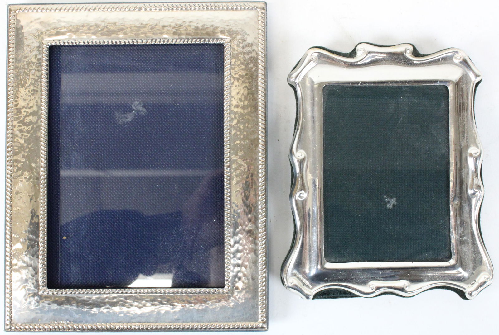 Two Sterling Silver Picture Frames: Two sterling silver picture frames, image size 4" x 5 1/2", 5 1/2" x7 1/2"