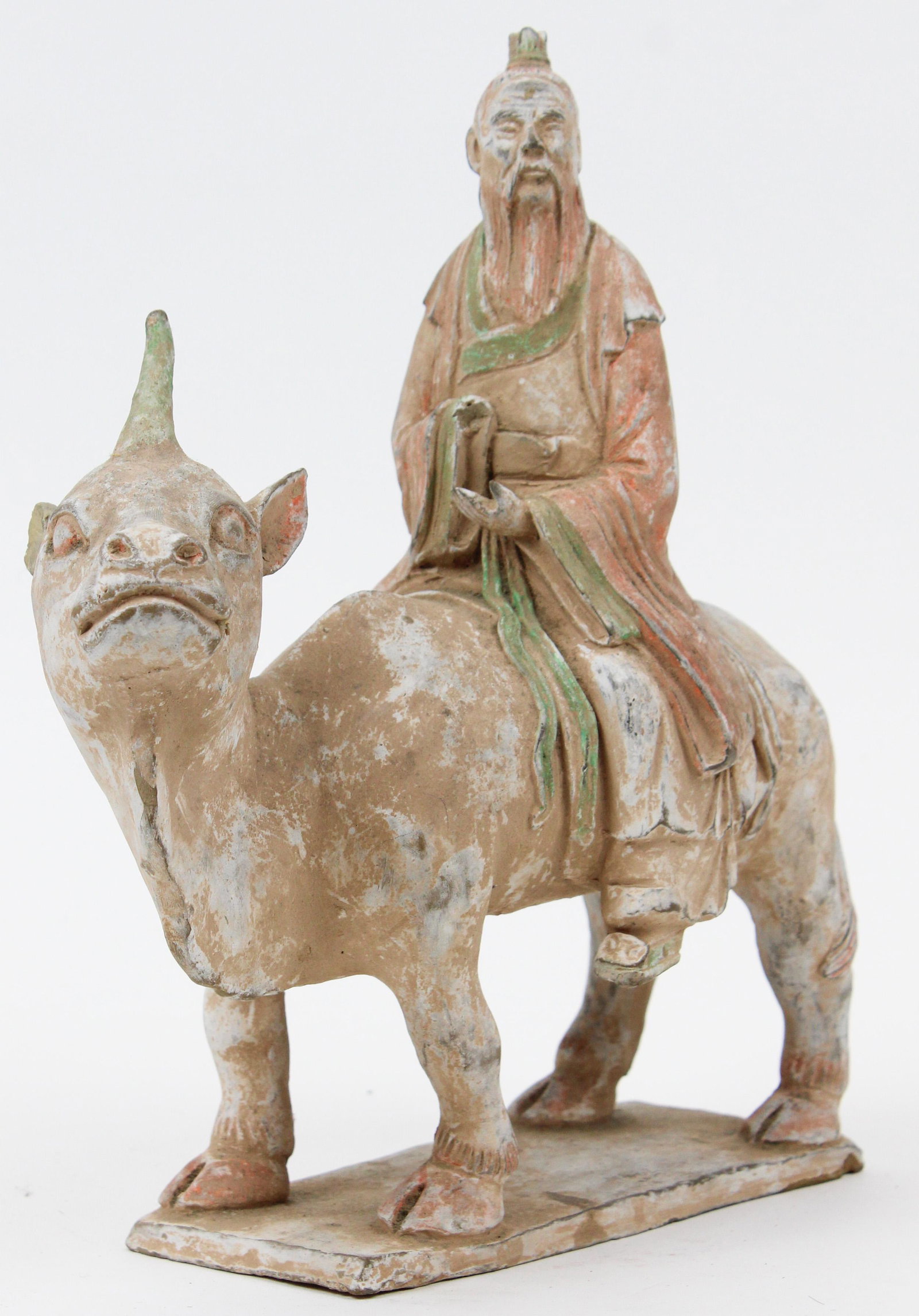 Chinese Tang Dynasty Qilin with Rider: Chinese Tang Dynasty (ca. 618 to 907 CE) large, hollow pottery minqi tomb figure of a Qilin mythological creature with rider, descending from Albert Shaw (1857- 1947), Author, Historian, Editor of the