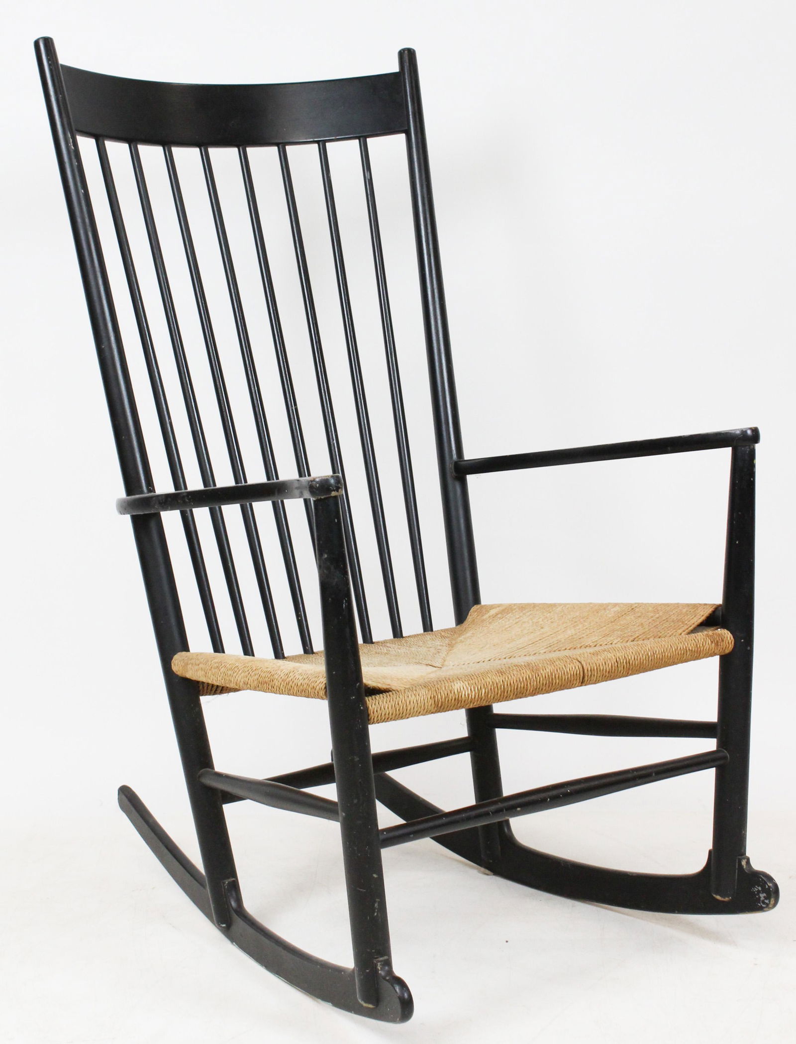 Hans Wegner Rocking Chair: hans Wegner Danish modern rocking chair. Ebonized, rope cord seat, Model J16, FDB Mobler, 43" h, 28"d, 25"w.