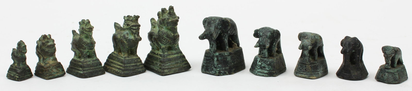 Nepalese Chinese Bronze Scale Weights: Two sets of Nepalese/ Chinese bronze scale weights, hts 1" to 1 7/8"