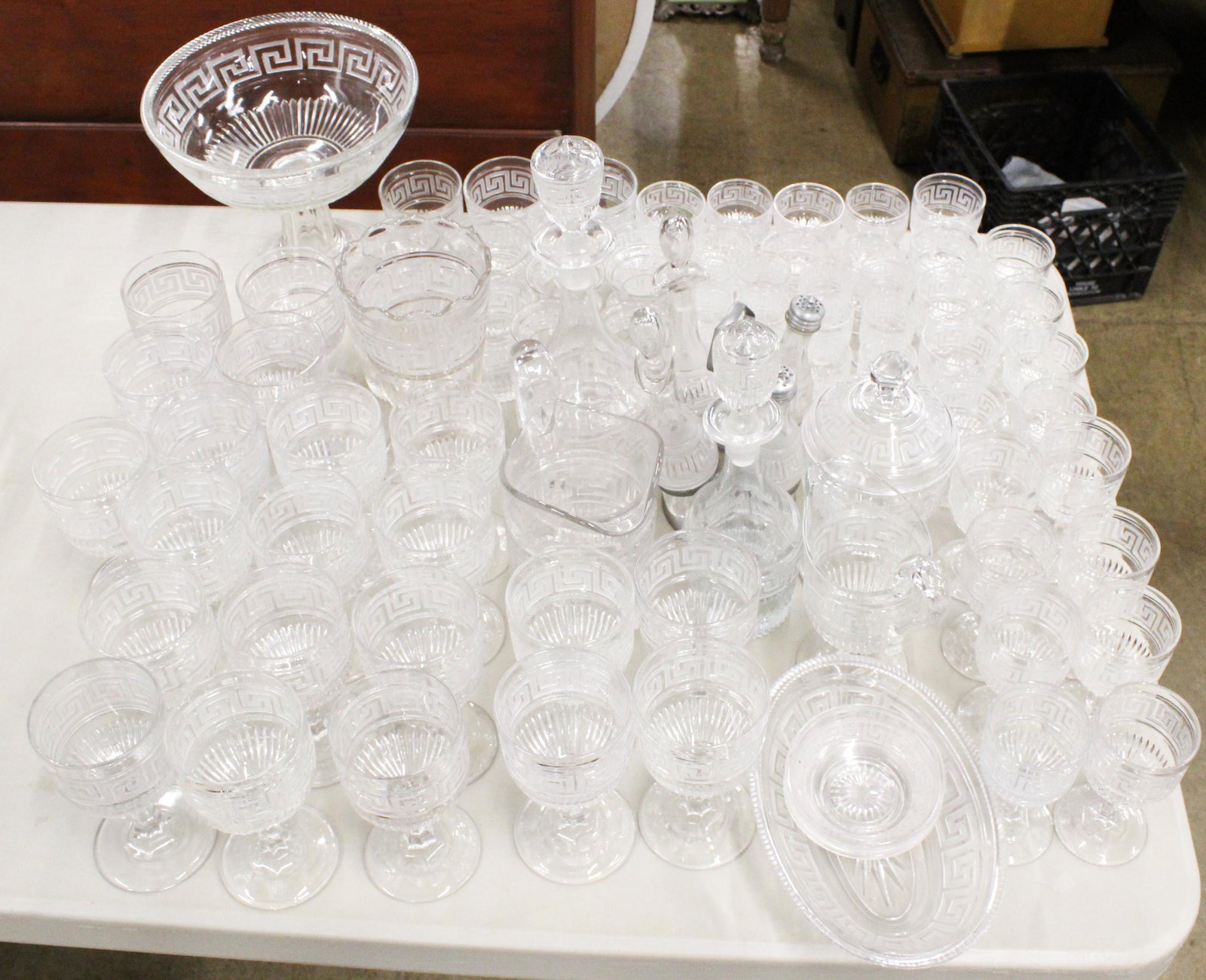 88 pcs. Sandwich Greek Key Pattern Flint Glass: Collection of 88 pcs. mid 19th . EAPG Boston and Sandwich Greek Key flint pattern glass tableware including compote, decanter, tumblers, water goblets, cordials, caster set, spooner, celery vase, pitc