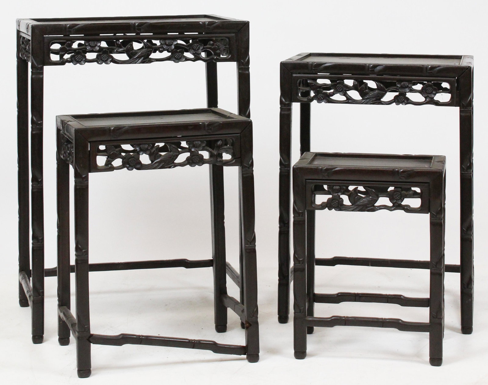 Set of Late 20th c Chinese Nesting Tables: Set of 4 Late 20th c Chinese carved nesting tables/ stands, hts 16" to 27"