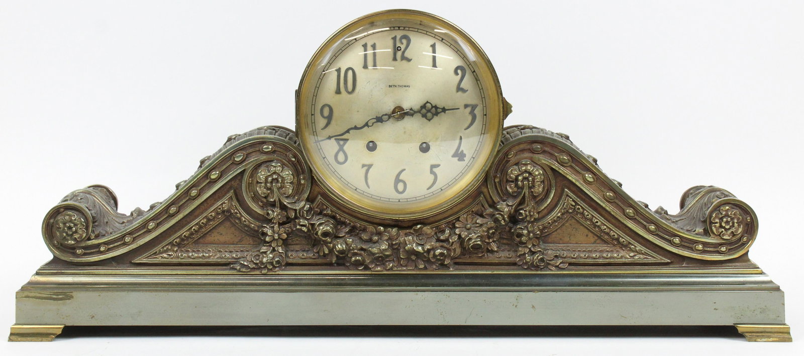 Seth Thomas Ornate Brass Case Mantle Clock: Seth Thomas long ornate brass cased mantle clock, length 24 3/4", ht 10 1/2"