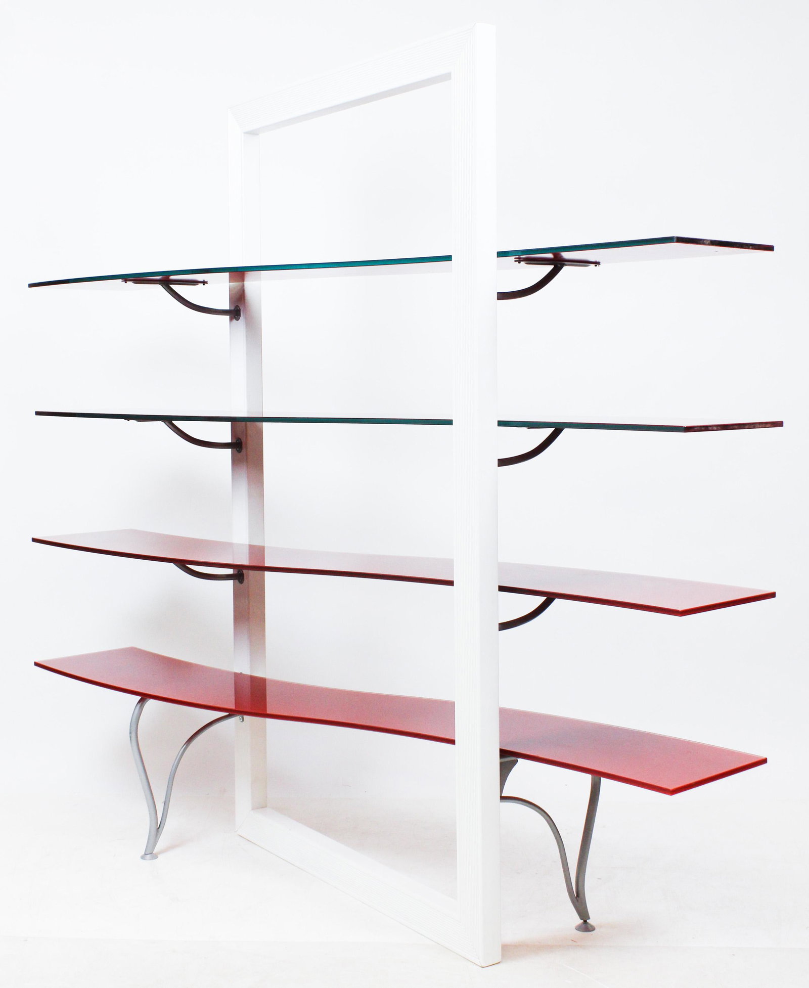 Modern Glass Curved Shelf Unit: A mid-century modern 4 shelf unit with open white molded frame having 4 curved red plate glass shelves on mat silver supports. 71" h, 71" wide, 18" deep. Possibly Bell'Oggetti Italy.