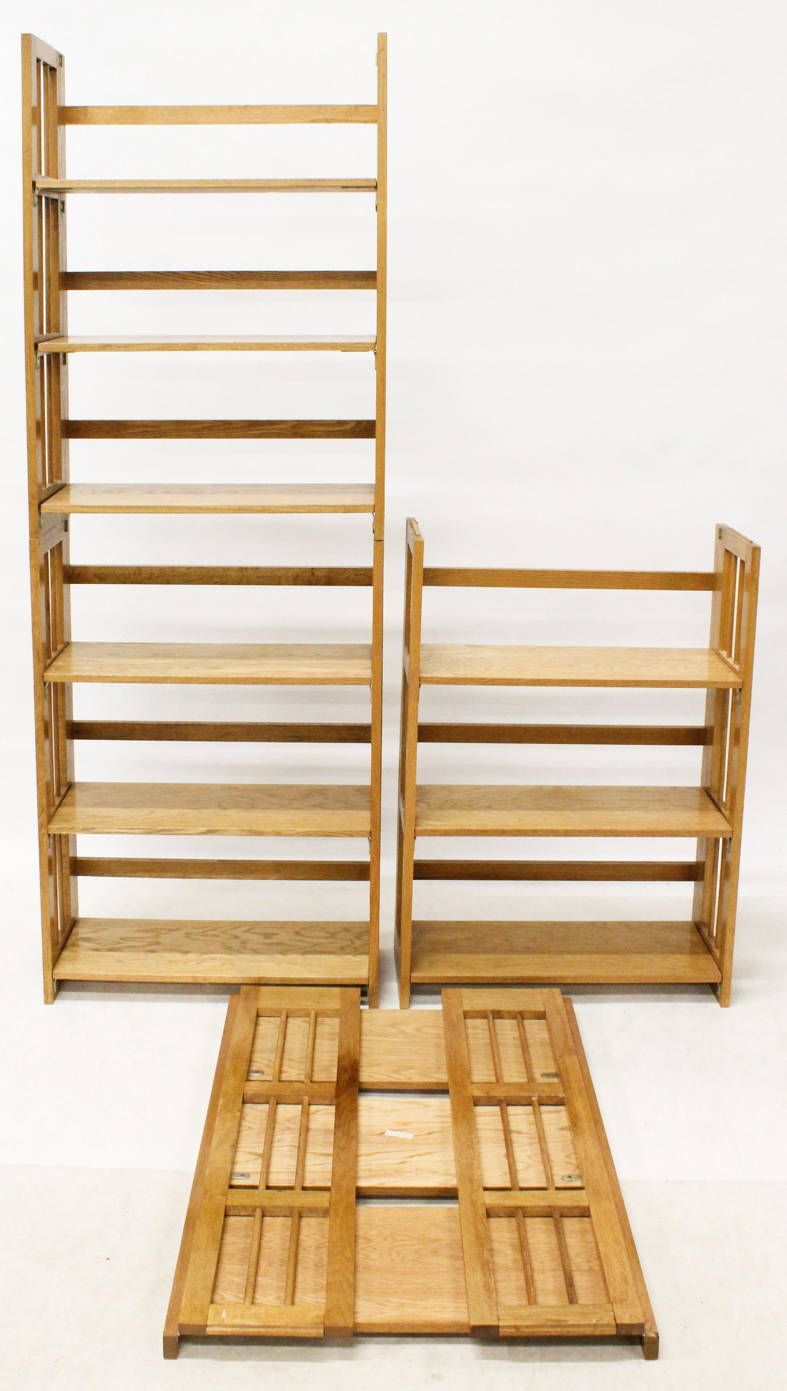 Four Oak Folding Bookcases: Four oak folding bookcases 40 x 28 x 10"