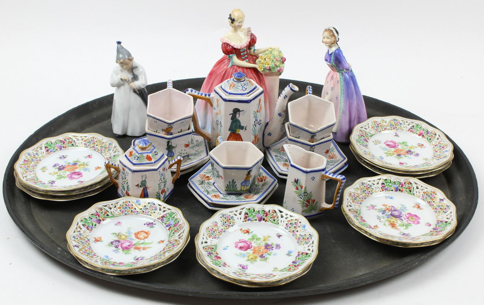 Lot of Mixed European Ceramics, Quimper: Group of mixed European ceramics including 12 pc. Quimper France faience decorated hexagonal form demitasse set, 12 Shumann Dresden reticulated dessert plates, Royal Copenhagen and Royal Doulton figur