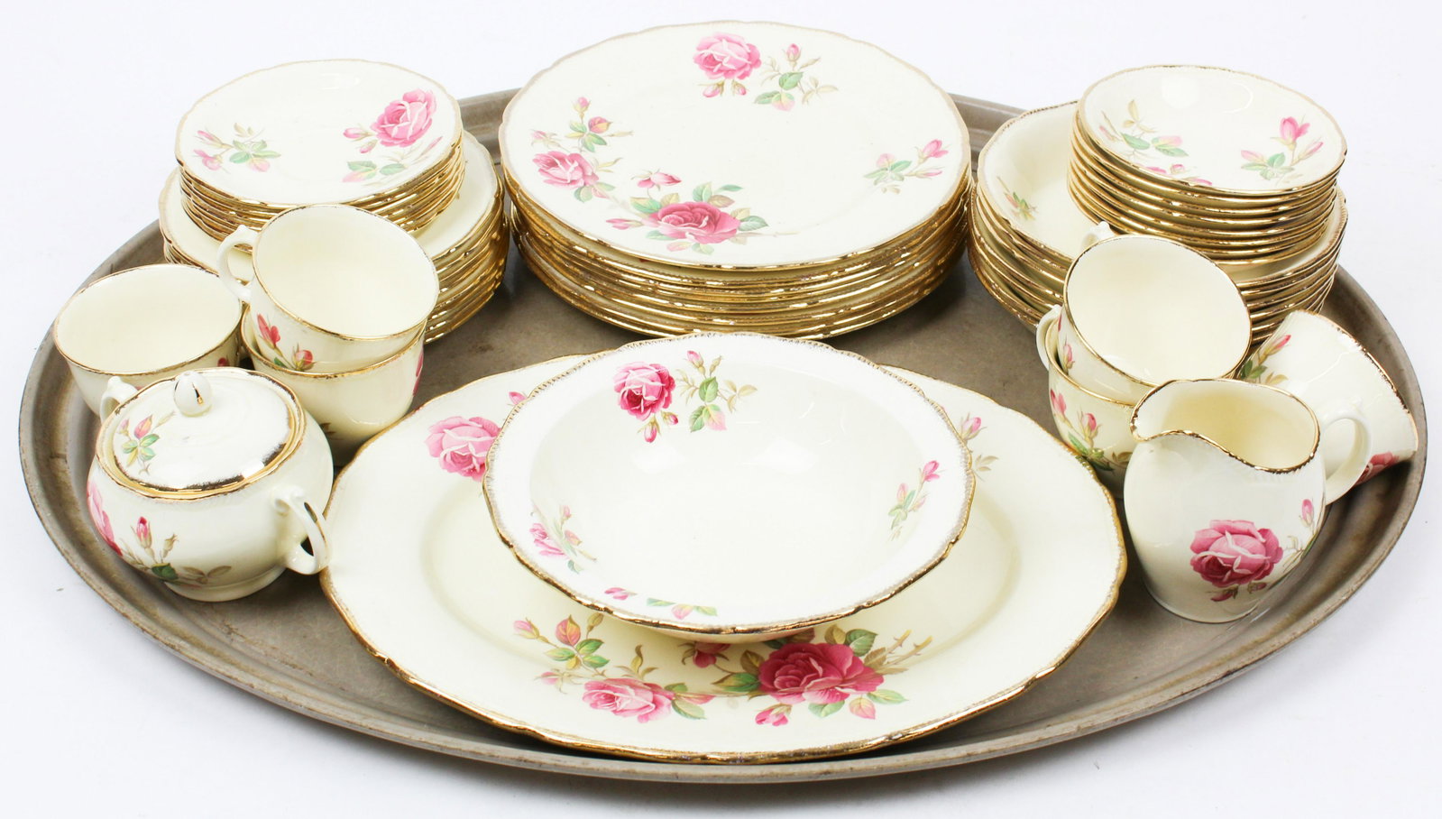 48 pcs. Staffordshire Royal Swan Dinnerware: 48 pcs. 1940's Staffordshire England Royal Swan rose decorated gold edge porcelain dinnerware including serving bowl and platter, sugar and creamer, 6 cups and saucers, dinner plates, soup bowls, side