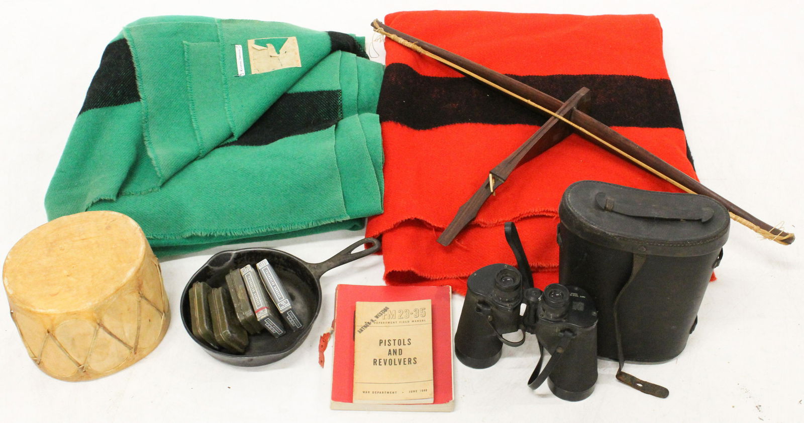 Hudson Bay Blankets, Crossbow, Drum, Skillet: Hudson Bay blankets (edges worn), SE Asian crossbow, small drum, US Marine Corps Mark 46 binoculars, military first aid kits, cast iron skillet