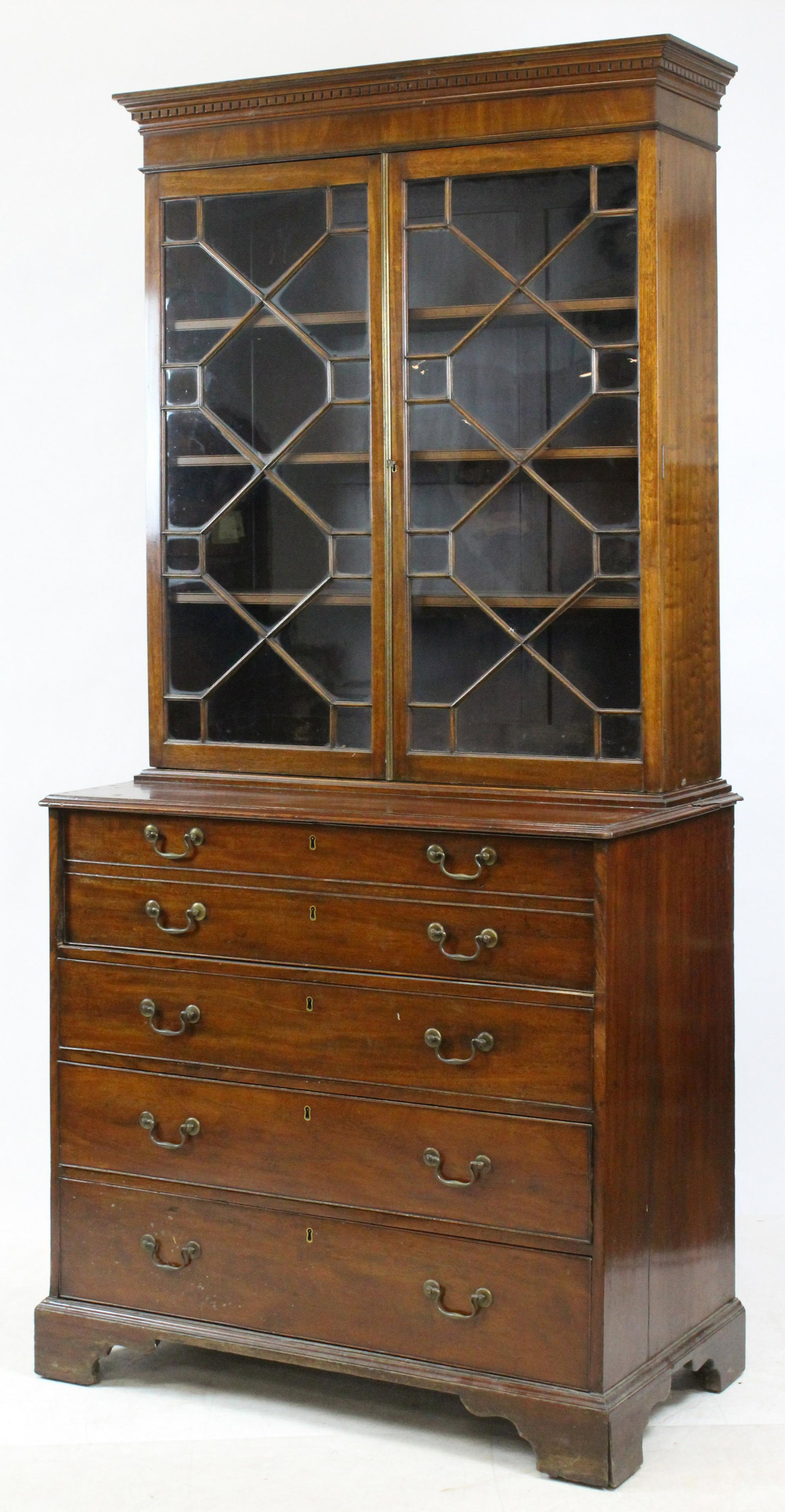 George III Mahogany Butler's Breakfront: Fine 18th c George III mahogany butler's breakfront. Dentil molded cornice molding, double doors with Chinese style panes. Top drawer on lower section with double false drawer fronts, drop front with 