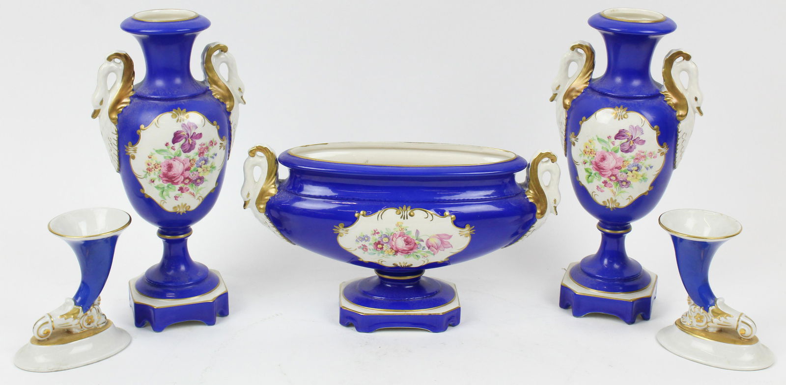Early 20th c. 5 pc. Porcelain Garniture Set: Early 20th c. five piece cobalt blue decorated porcelain mantel garniture set including pair of urns, centerpiece bowl, and 2 hron shaped vases (marked Czechoslovakia) ht. 4"-10.25"