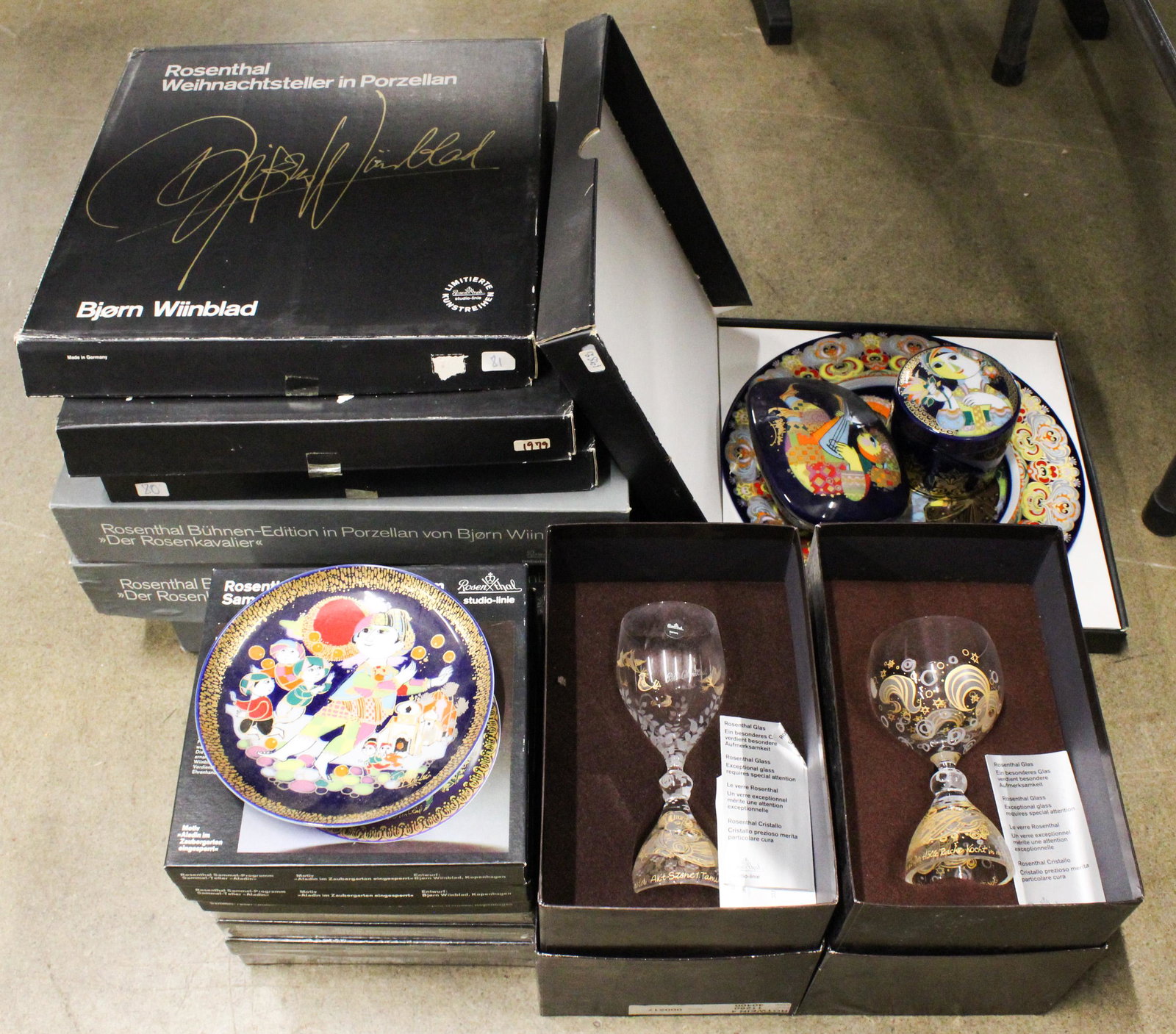 Collection of Rosenthal Bjorn Wiinblad Plates: Collection of Rosenthal porcelain Bjorn Wiinblad Studio Linie mid century artistic commemorative plates including 8 small Alladin series, 7 larger Christmas plates, two covered dresser jars, accompani