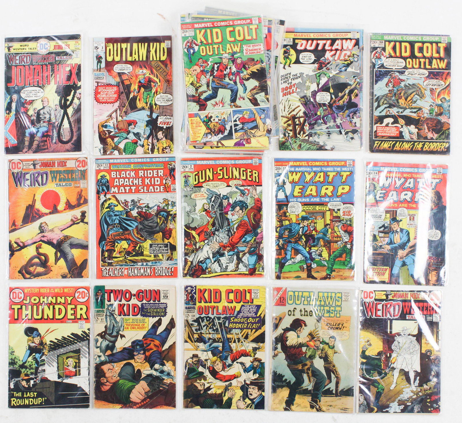 Western Comics Silver and Bronze Age: Silver & Bronze Age Western DC & Marvel comic books (32 pcs), including Kid Colt Outlaw, Rawhide Kid, som with tears, stray pen marks