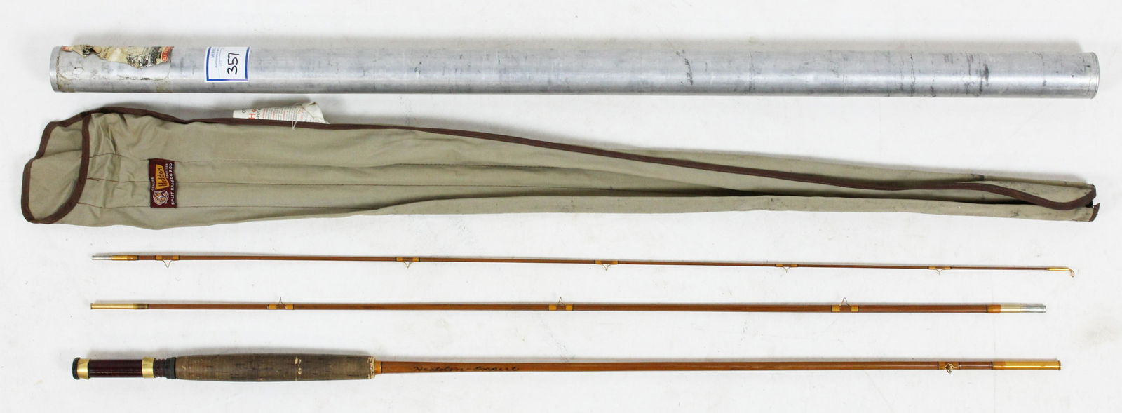 Heddon Bamboo Fly Rod: Vintage Heddon bamboo fly rod. "Heddon Expert" #125 8 1/2', 2-F HDH or E. 3 piece. With original bag and tube. Worn but bamboo and eyelets in good condition.