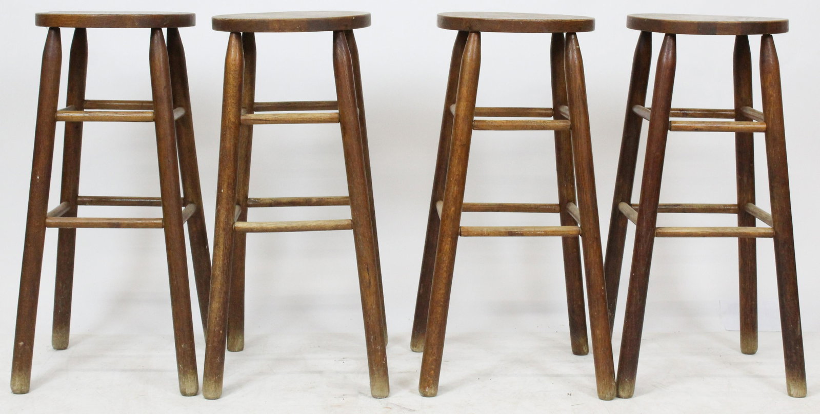 Set of 4 Classic Oak Canted Leg Bar Stools: Set of 4 classic oak canted leg bar stools with round seats in older mellowed finish 30" x 15" x 15"