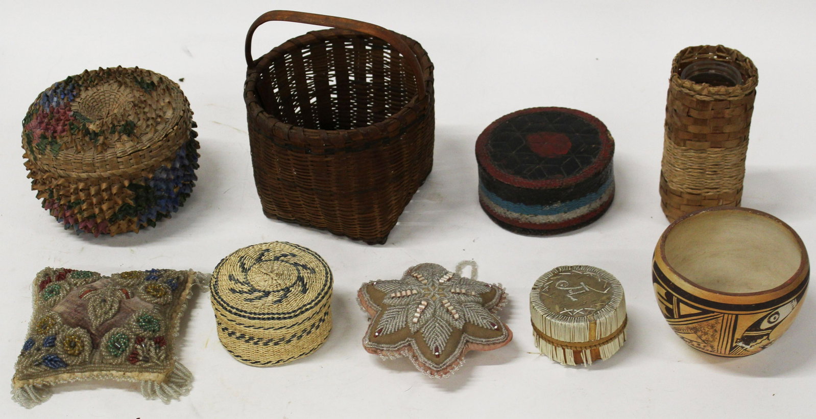 Lot of 19th c First Nations Items: Lot of 19th and early 20th c First Nations items including Iroquois Beaded pin cushions, baskets, Acoma Pot etc.