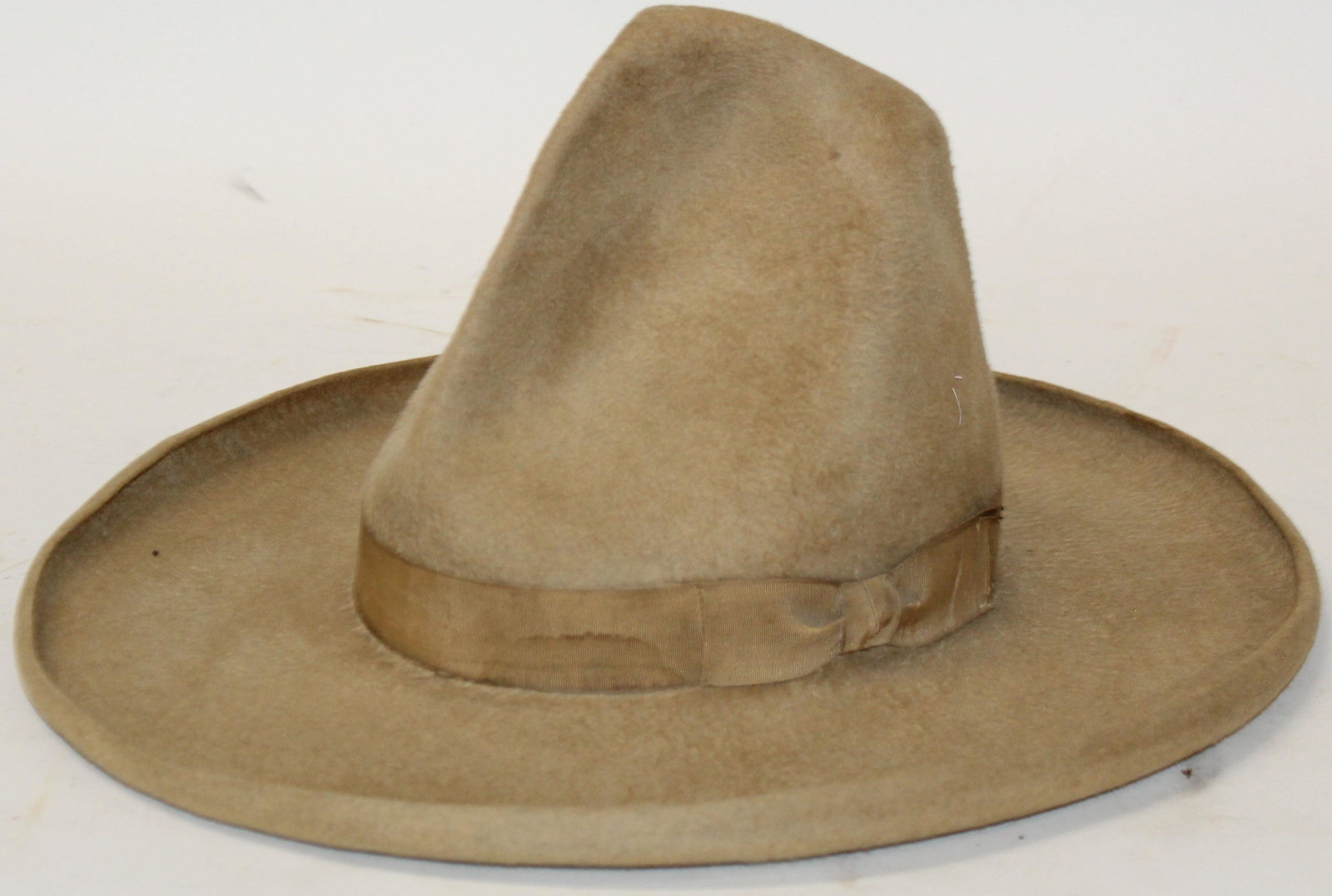 Circa 1930 Tom Mix style western hat: Circa 1930 vintage Tom Mix or Montana Peak style cowboy hat with grosgrain band and curled brim, size 7 1/2