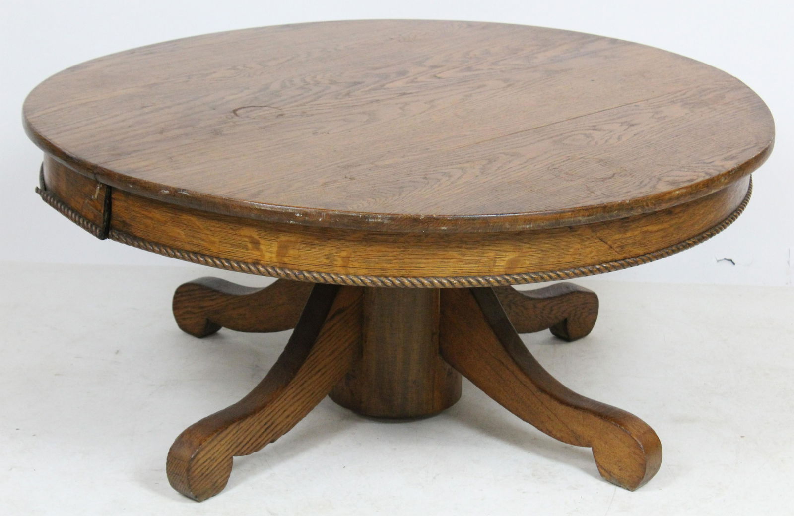 Round Oak Pedestal Base Coffee Table: ca. 1900 round golden oak pedestal base coffee table -made from a shortened extension dining table 18" x 40" -portions of skirt delaminating