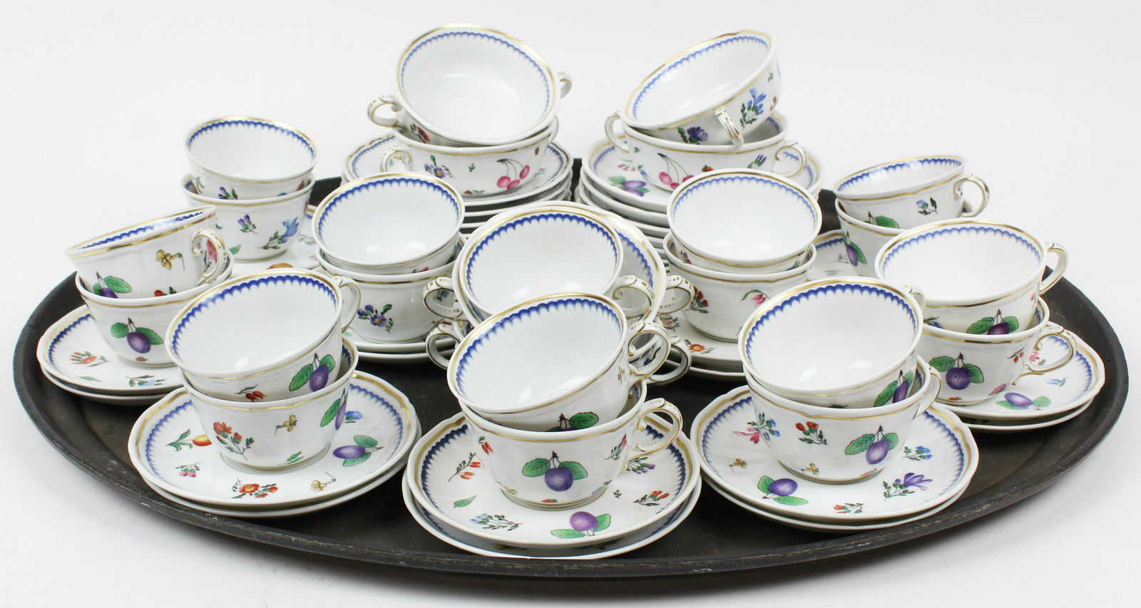 54 pcs. Richard Ginori Porcelain Tableware: 54 pcs. Richard Ginori Italian fine porcelain tableware including many tea cups and saucers, double handled bouillion or cream soup bowls, dessert plates with fruit and floral decoration -some wear to