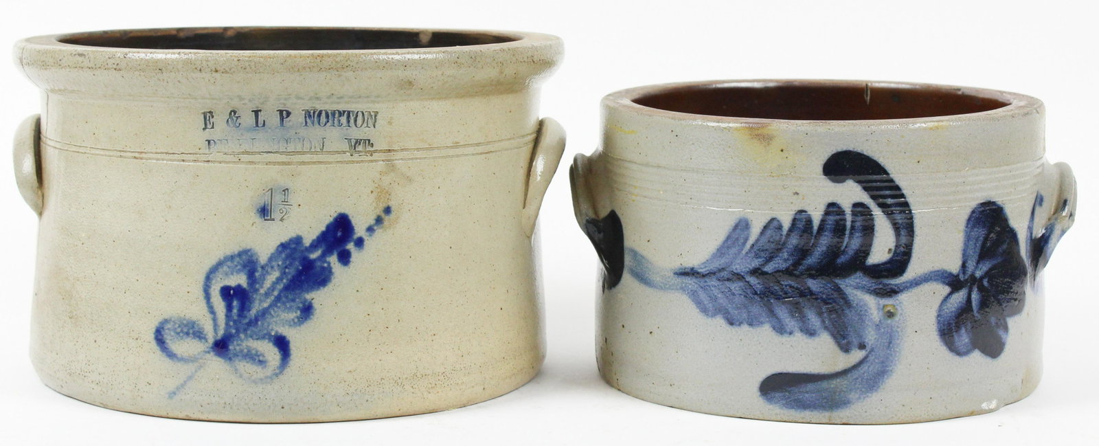 Two 19th c Blue Decorated Crocks: Two 19th c blue decorated stoneware crocks- E & L P Norton, Bennington, VT and Pennsylvania, 1 1/2 gallon, 1 gallon, both with cracks, hts 6 1/4", 5 1/4"