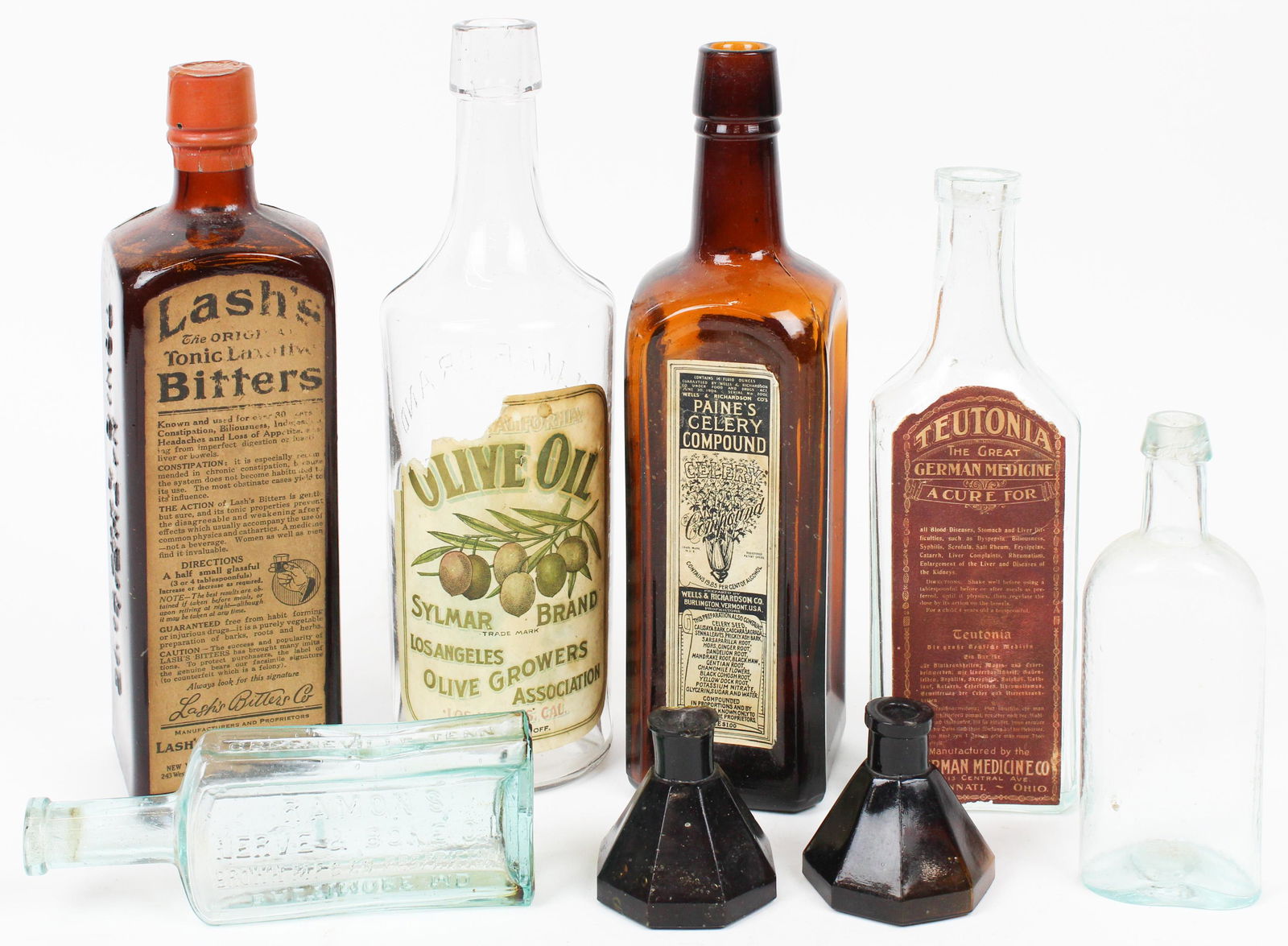Vintage Bottles including Vermont Medicine: Vintage bottles including Vermont medicine- Paine's Celery Compound with labels, dark glass umbrella ink, Lash's Bitters with contents, etc., hts 2" to 9"