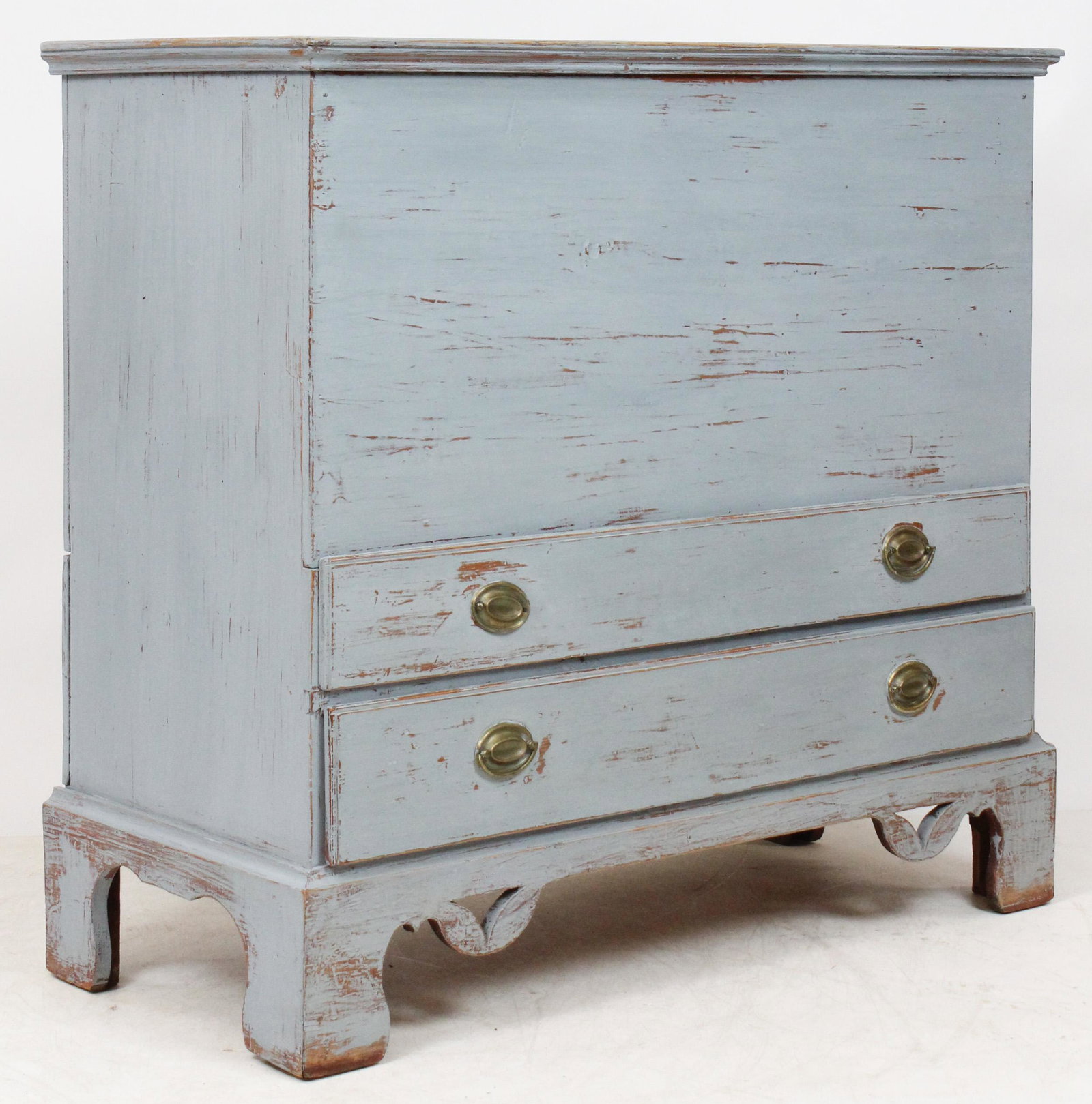 Ca. 1800 Chippendale Lift Top Blanket Chest: American ca. 1800 Chippendale lift top, two lower lipped drawers, on a bracket base. Later scrubbed blue paint. Pine, snipe hinges, good overall condition. 42" wide, 39" h, 19" deep.